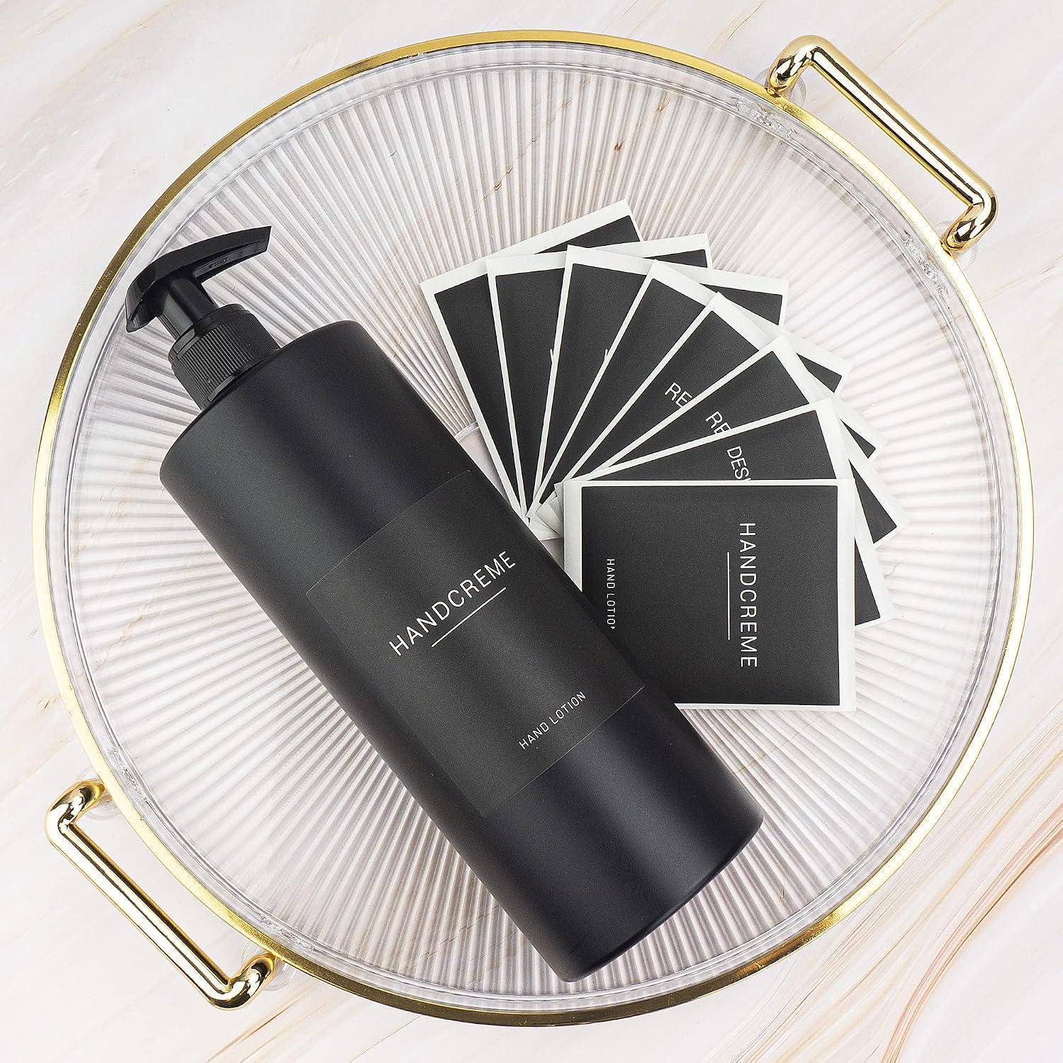 Schwarze HANDCREME Handlotion Flasche auf einem Tablett mit mehreren passenden Musterkarten