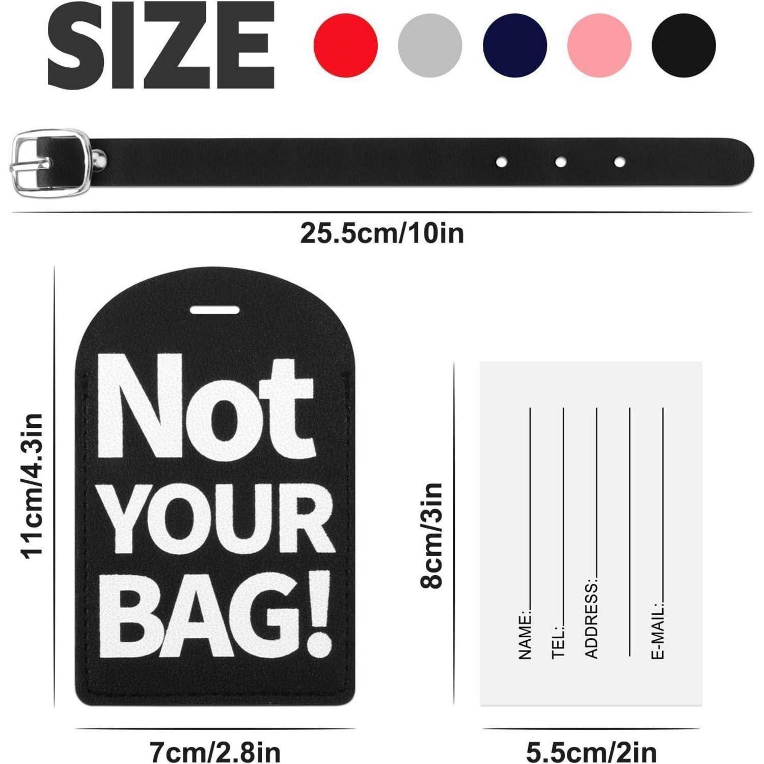 Schwarzes Gepäckanhänger mit „Not YOUR BAG!" auf der einen Seite und leere ID-Karte auf der anderen Seite; Größe 11 x 7 cm, Riemen 25,5 cm.