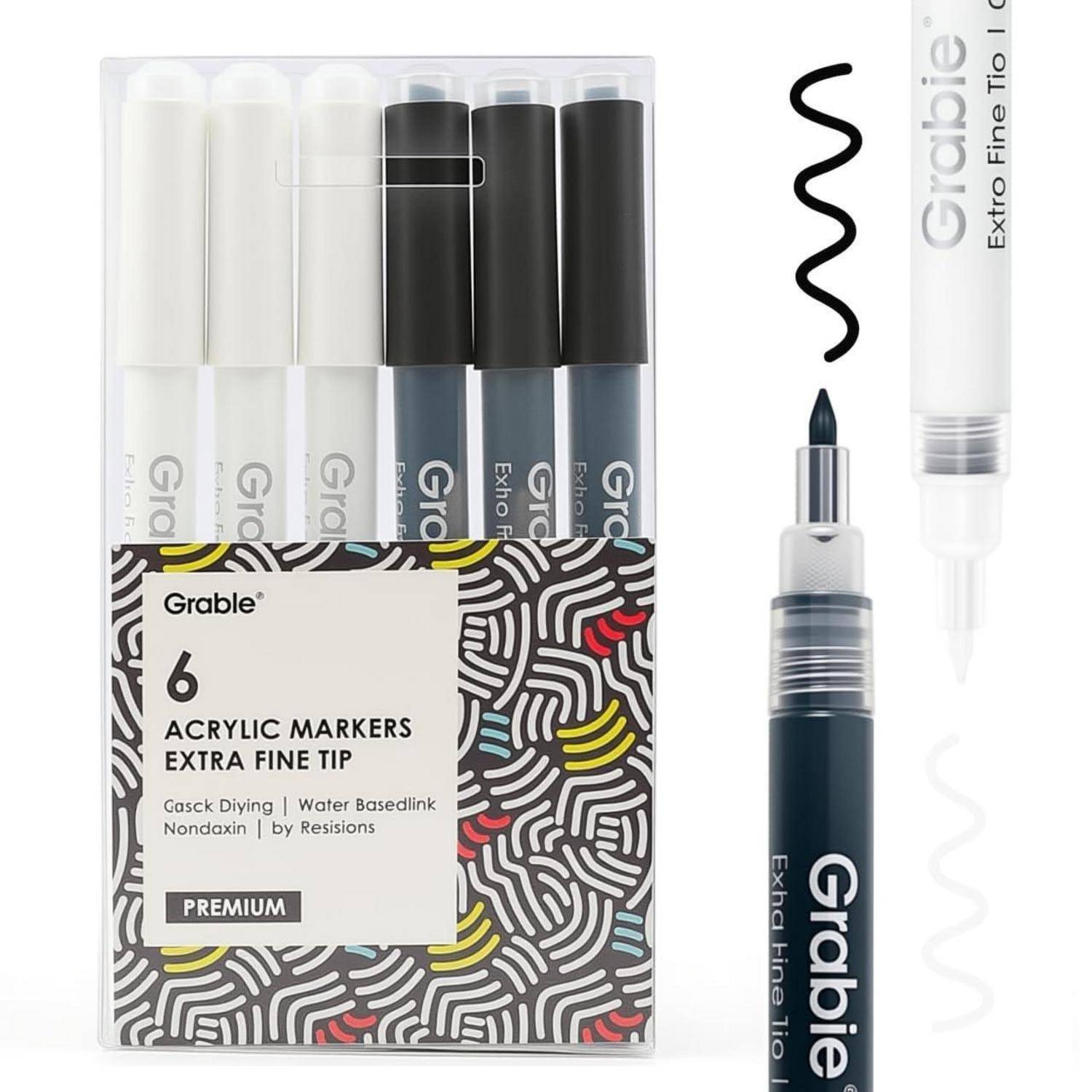 Packung mit 6 Grabie-Acrylmarkern mit extra feinen Spitzen, abgebildet in schwarzer, weißer und grauer Verpackung mit Musterinkstrichen.
