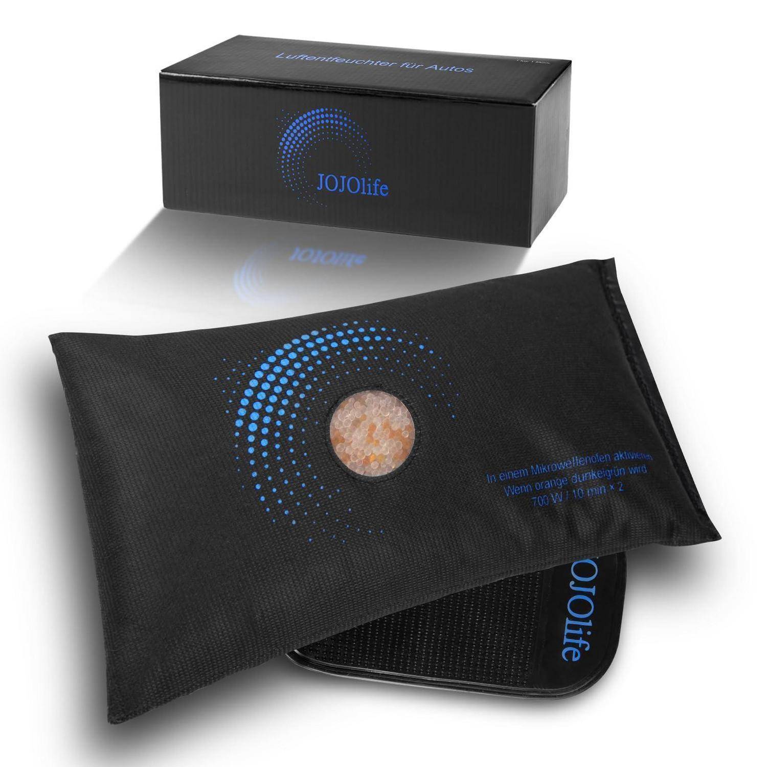 Schwarze JOJOlife beheizte Augenklappe mit leuchtendem blauem Kreisdesign, gezeigt mit ihrer Verpackungsbox auf weißem Hintergrund.