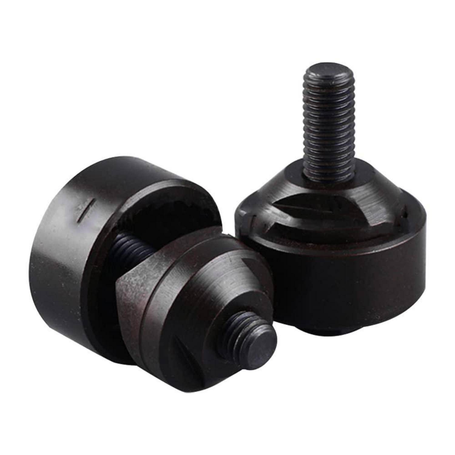 Drei schwarze Metallzylinder-Gewindebefestigungselemente auf weißem Hintergrund, eines aufrecht und eines zerlegt, um den Schraubenmechanismus zu zeigen.