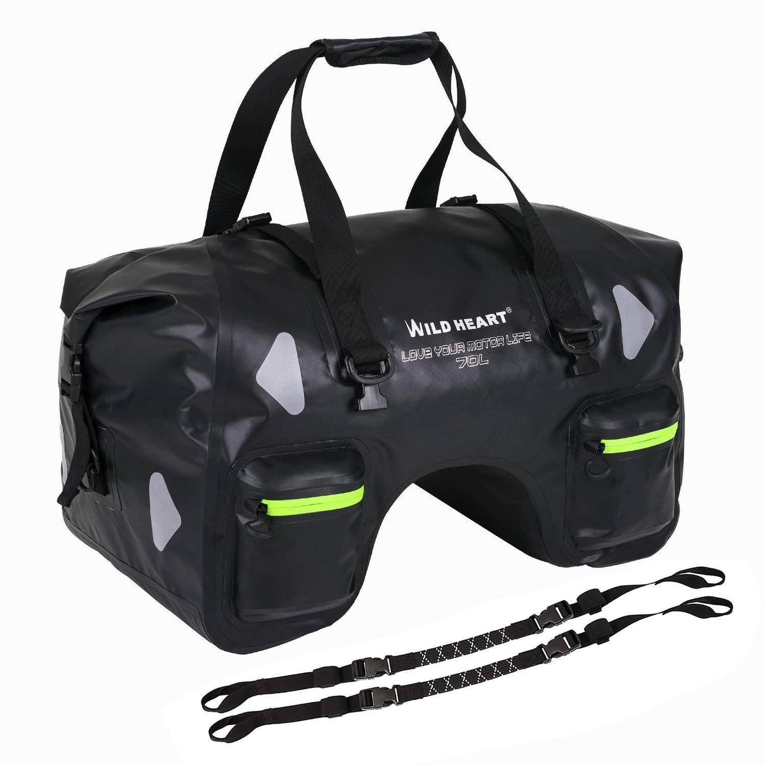 Schwarze 'Wild Heart' Transporttasche für Haustiere mit Griffen, vorderen Taschen, reflektierenden Akzenten und zwei abnehmbaren Schultergurten auf weißem Hintergrund.