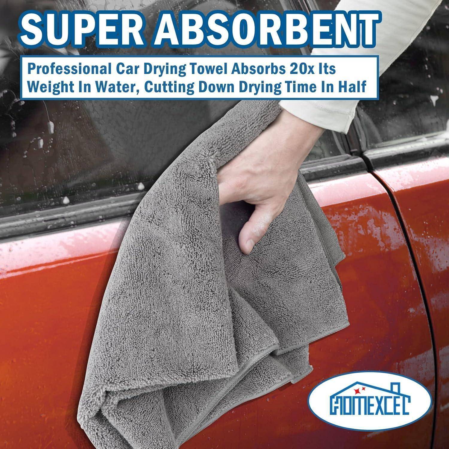 Eine Hand trocknet ein rotes Auto mit einem grauen Handtuch ab, mit dem Text „SUPER SAUGFÄHIG" und „Professionelles Auto-Trocknungstuch absorbiert das 20-fache seines Gewichts in Wasser und reduziert die Trocknungszeit um die Hälfte"".