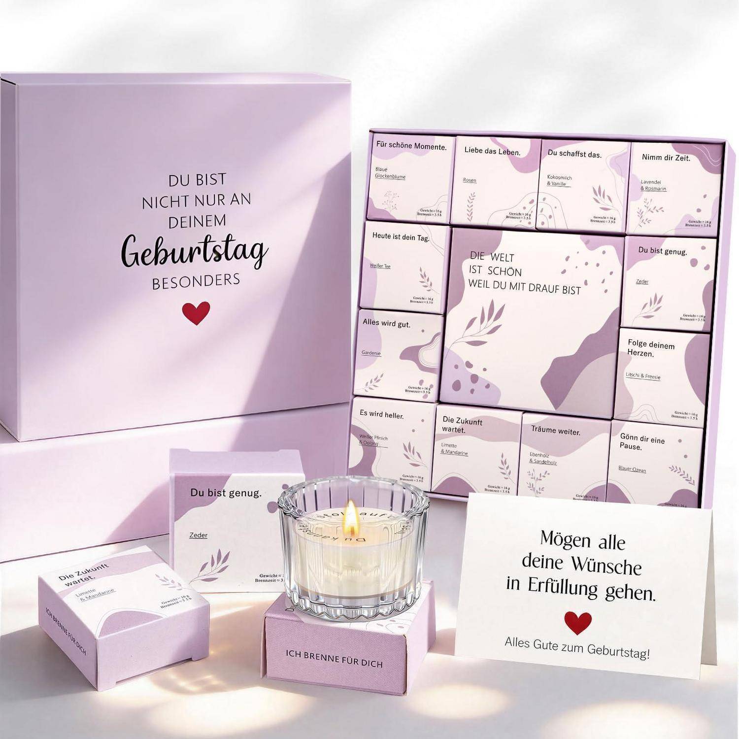 Pastellviolettes Geburtstagsgiftset mit verschiedenen Affirmationskarten, einer Kerze und einer Karte mit der Aufschrift „Mögen alle deine Wünsche in Erfüllung gehen.