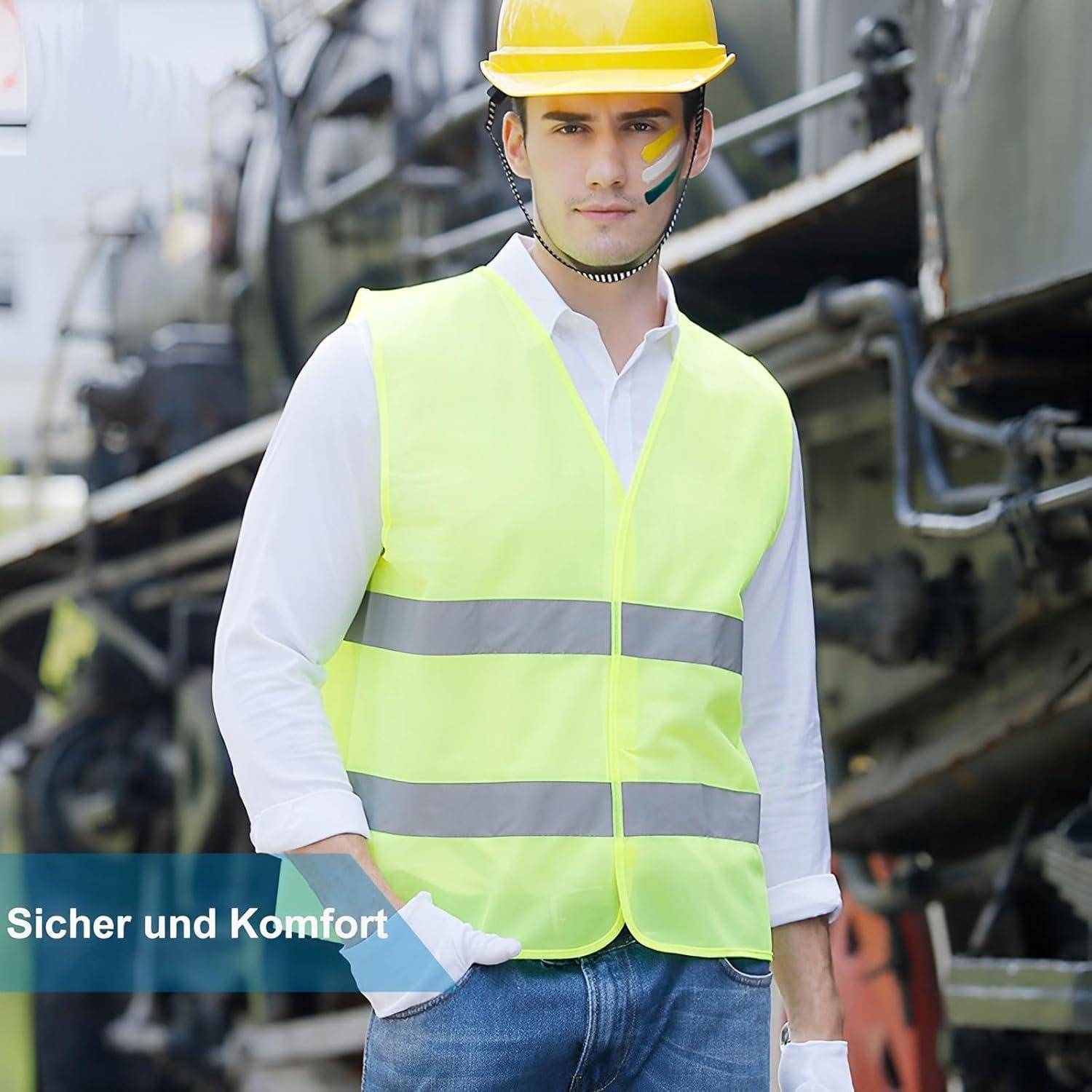 Mann in gelbem Schutzhelm und Warnweste, der neben einer Industriemaschine steht, mit dem Text 