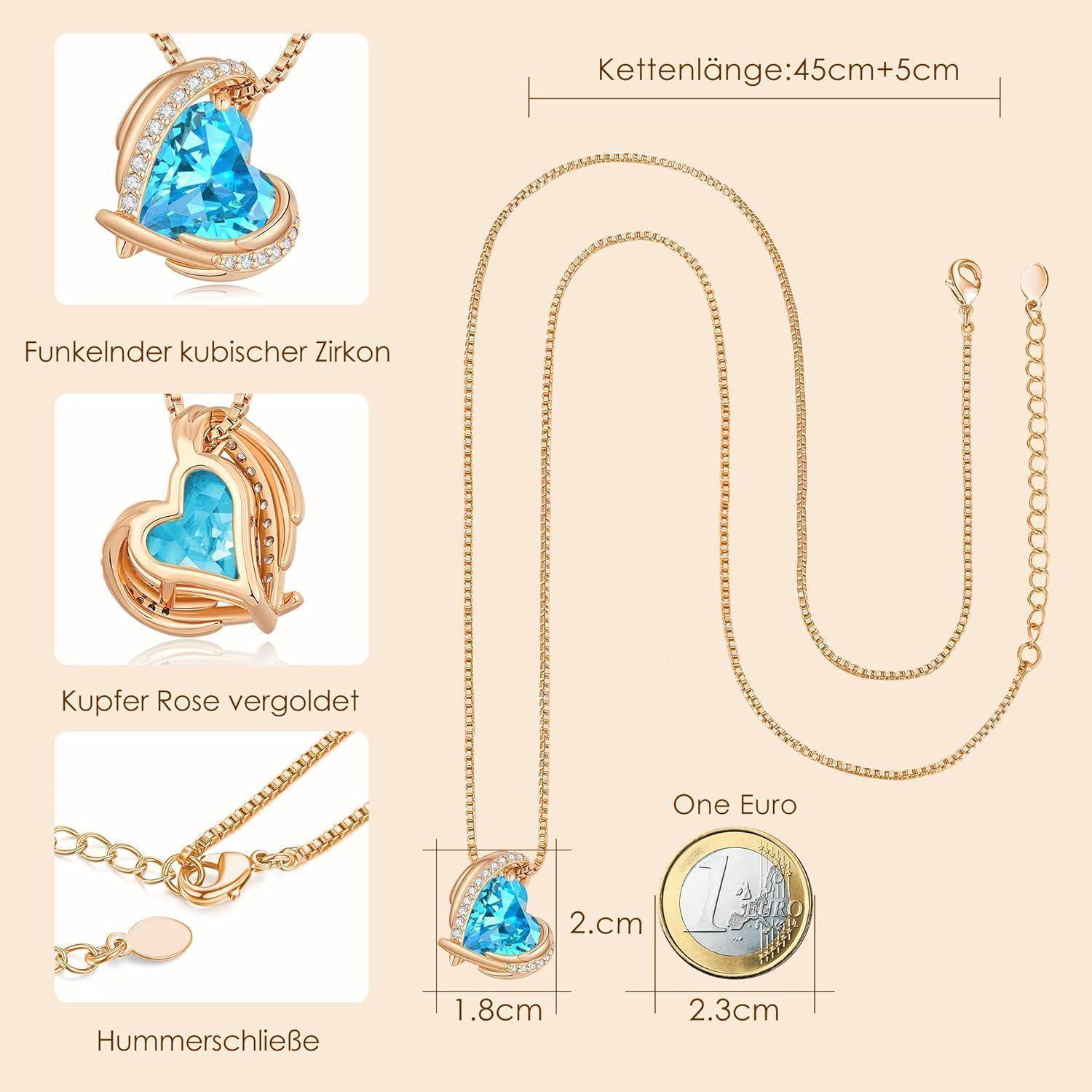 Goldtoniges Herzanhänger-Halskette mit blauem Zirkonia, gezeigt mit Hummerkrallenverschluss, 45 cm + 5 cm Kette, Anhängergröße 2,2 x 1,8 cm, neben einer 1-Euro-Münze zur Größenreferenz.
