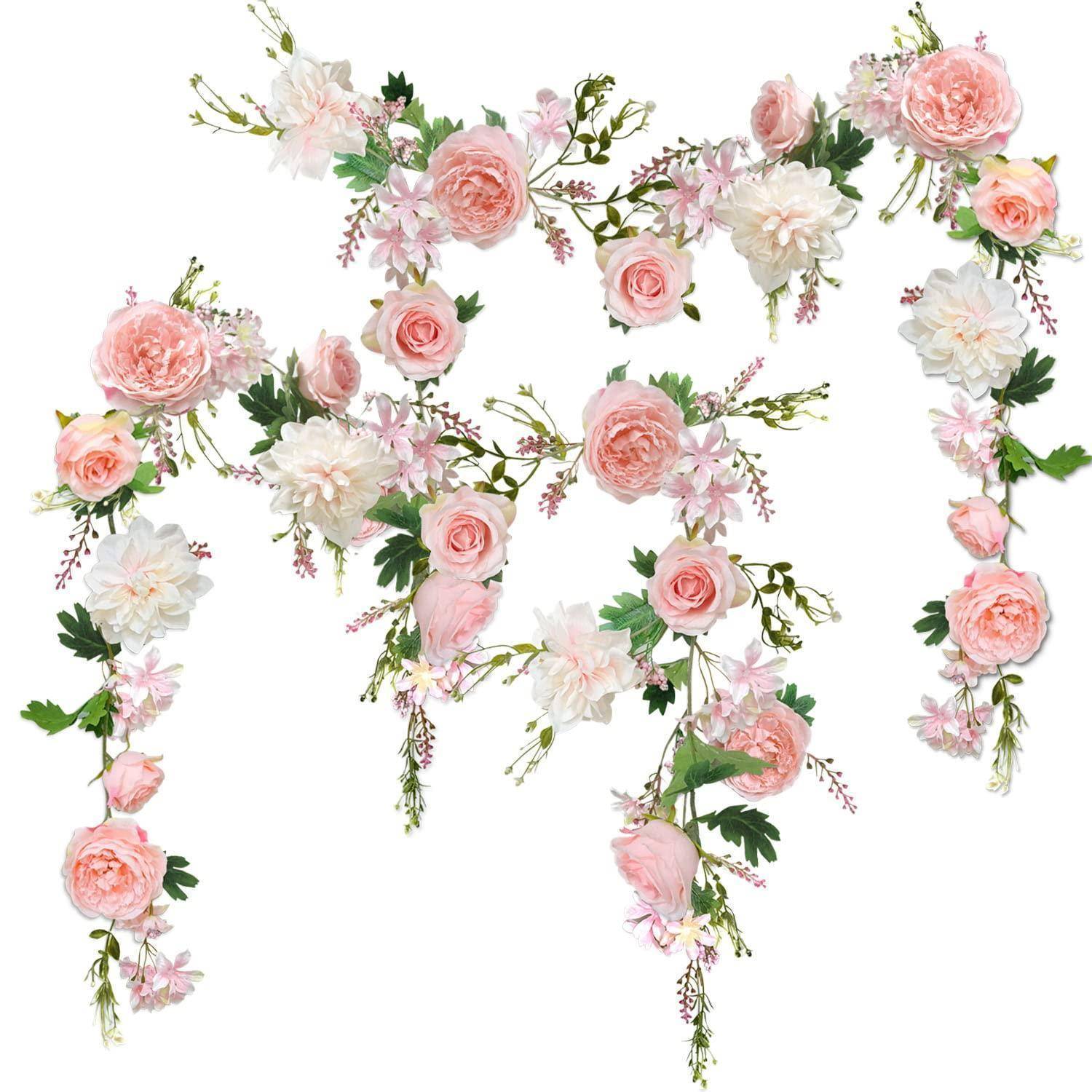 Rosa und weiße Blumengirlanden, die in einem dekorativen Hängerahmen auf weißem Hintergrund angeordnet sind.