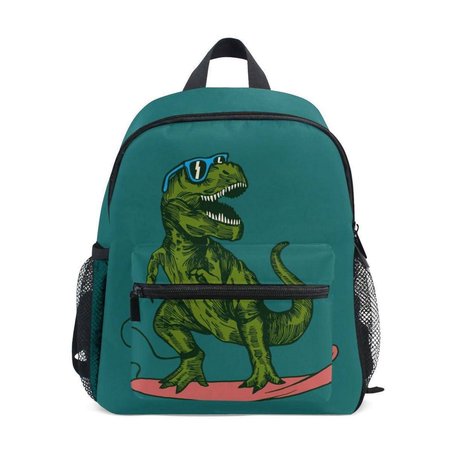Türkiser Rucksack mit einem grünen Dinosaurier, der blaue Sonnenbrille trägt und auf einem rosa Surfbrett steht.