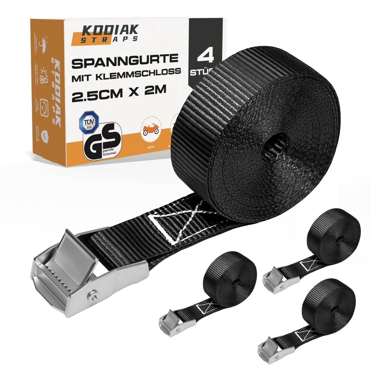 Produktbild von Kodiak Straps Ratschenschnallen-Spannriemen, zeigt eine schwarze 2,5 cm x 2 m Spannriemenrolle, metallische Schnalle und Karton mit der Aufschrift „SPANNGURTE MIT KLEMMSCHLOSS
