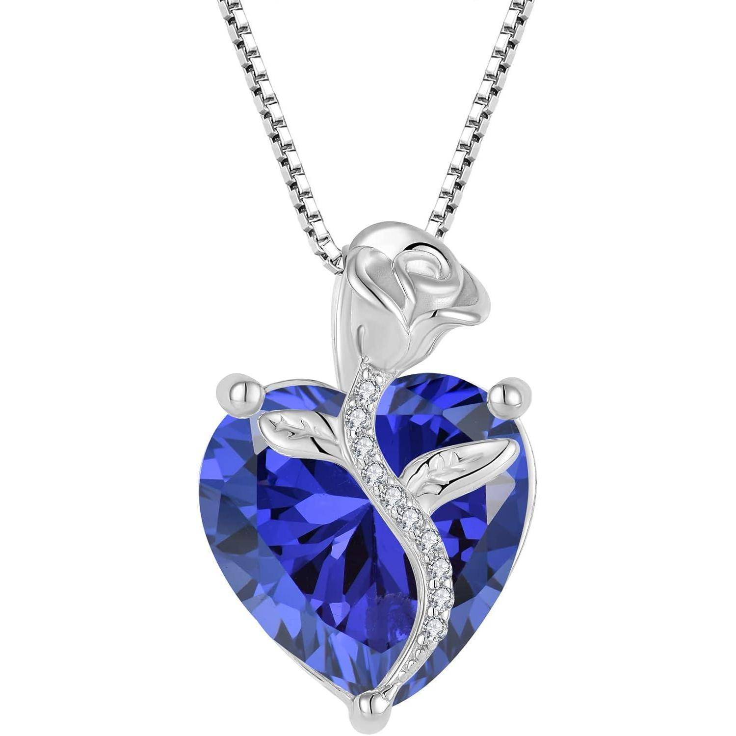 Silberrosenanhänger-Halskette mit einem blauen herzförmigen Edelstein und einem geschwungenen, diamantbesetzten Stiel