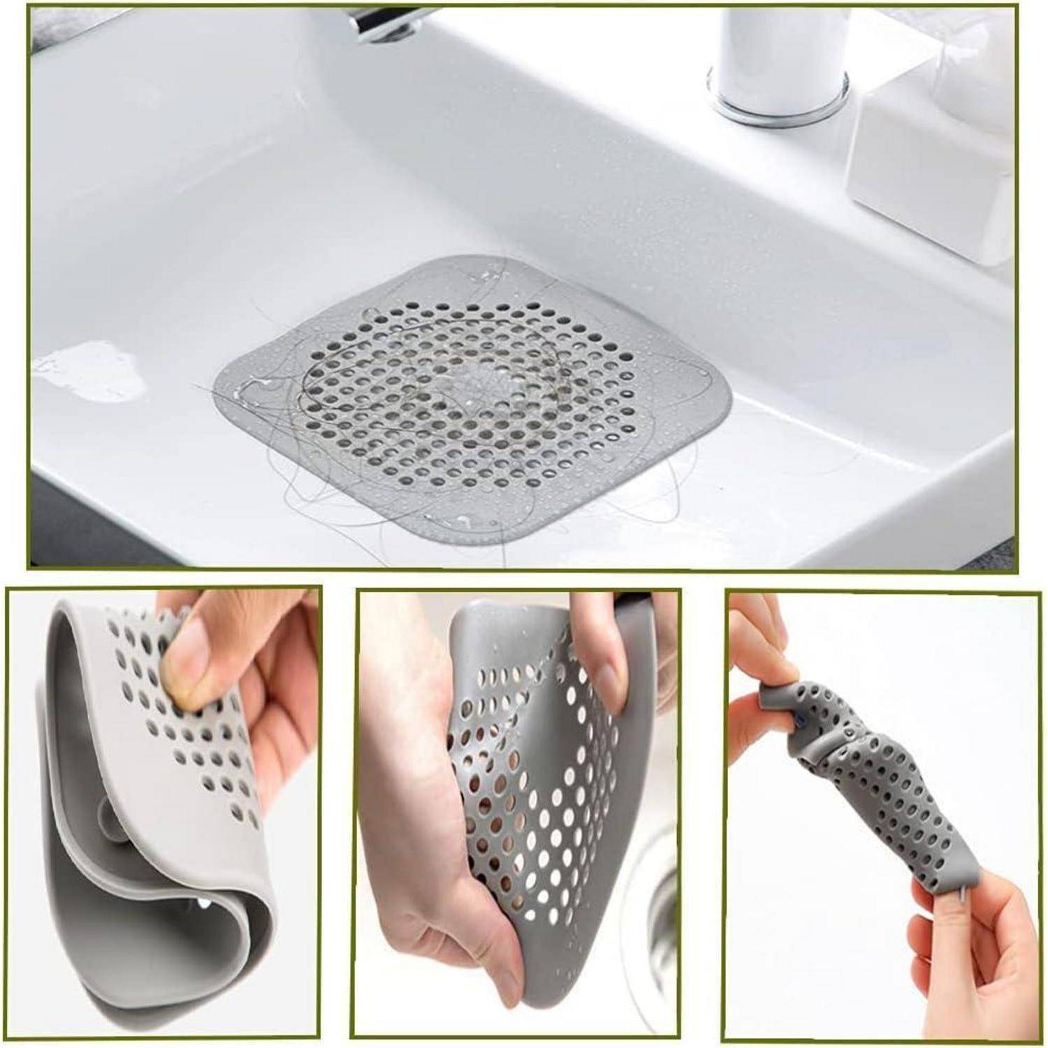 Graue perforierte Silikon-Spülenablaufabdeckung, die bei der Verwendung gezeigt wird und gebogen wird, wobei ihr flexibles, ablauf-fangendes Design hervorgehoben wird.
