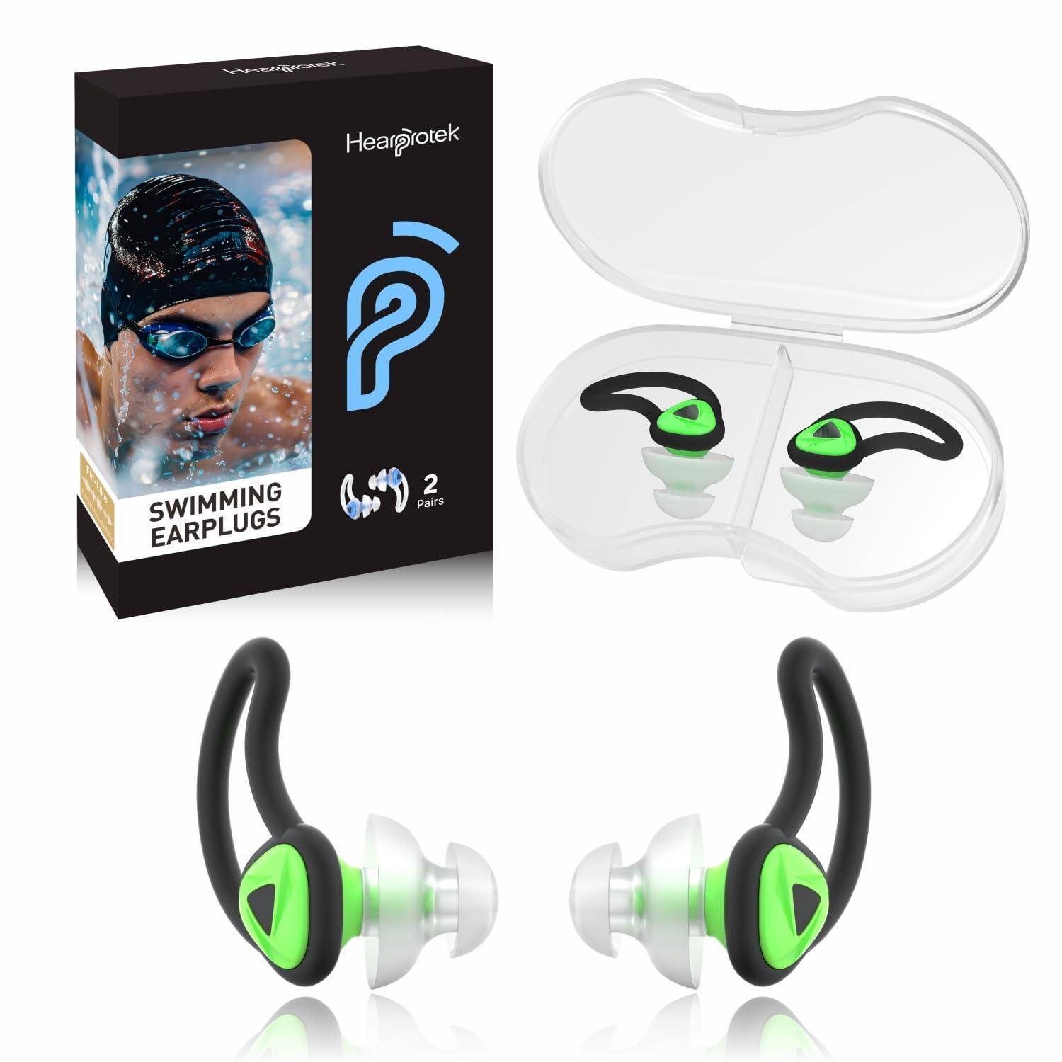 Produktbild von Headprotek Schwimm-Ohrstöpseln mit der Schachtel, transparentem Etui und zwei schwarz-grünen Ohrstöpseln mit Beschriftung zum Schwimmen, 2 Paar.