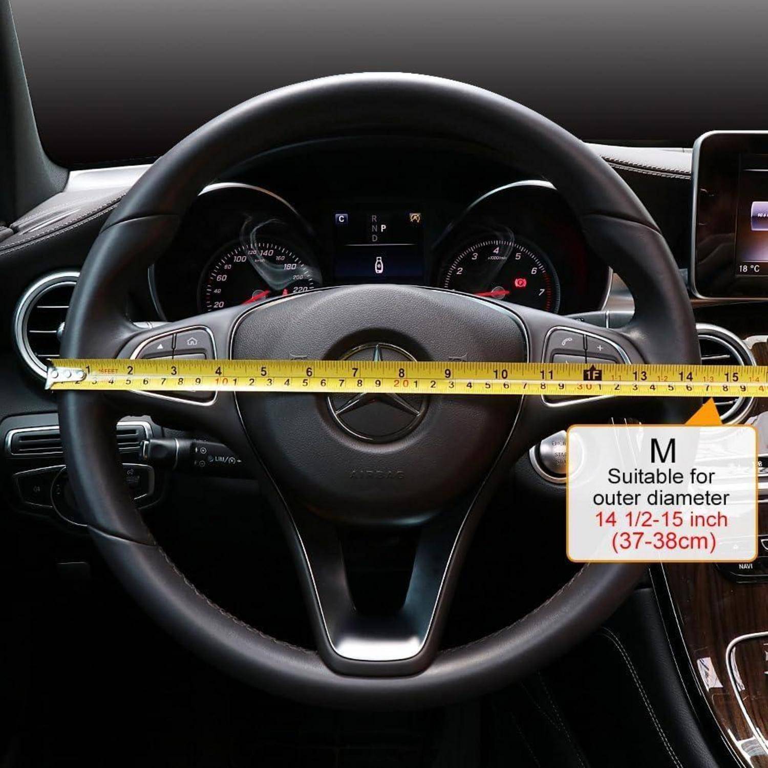 Automobillenkrend mit Maßstab gemessen, gekennzeichnet als geeignet für Außendurchmesser 14 1/2 bis 15 Zoll (37-38 cm).
