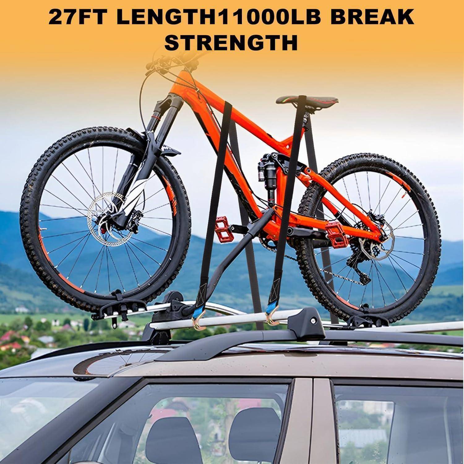 Oranges Mountainbike vertikal auf einem Autodachträger montiert; Text liest „27FT LÄNGE 11000LB BRUCHFESTIGKEIT