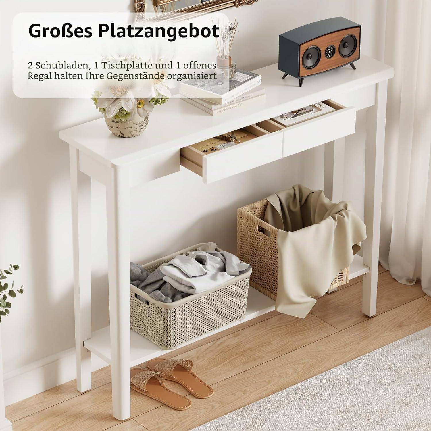 Weißer Konsolentisch mit 2 Schubladen, einer oberen Ablage und Stauraum im unteren Bereich für Körbe, Schuhe und einen drapierten Behälter; Deutscher Text sagt "Großes Platzangebot"" und ""2 Schubladen, 1 Tischplatte und 1 offenes Regal halten Ihre Gegenstände organisiert"".