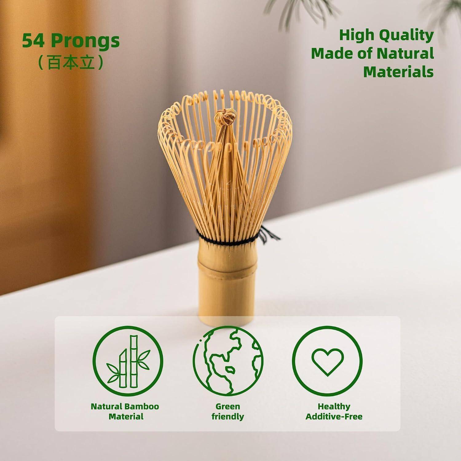 Bamboo-Schneebesen mit 54 Zinken, gekennzeichnet als aus Naturmaterialien hergestellt, plus Symbole, die natürlichen Bambus, Umweltfreundlichkeit und Zusatzstofffreiheit anzeigen.