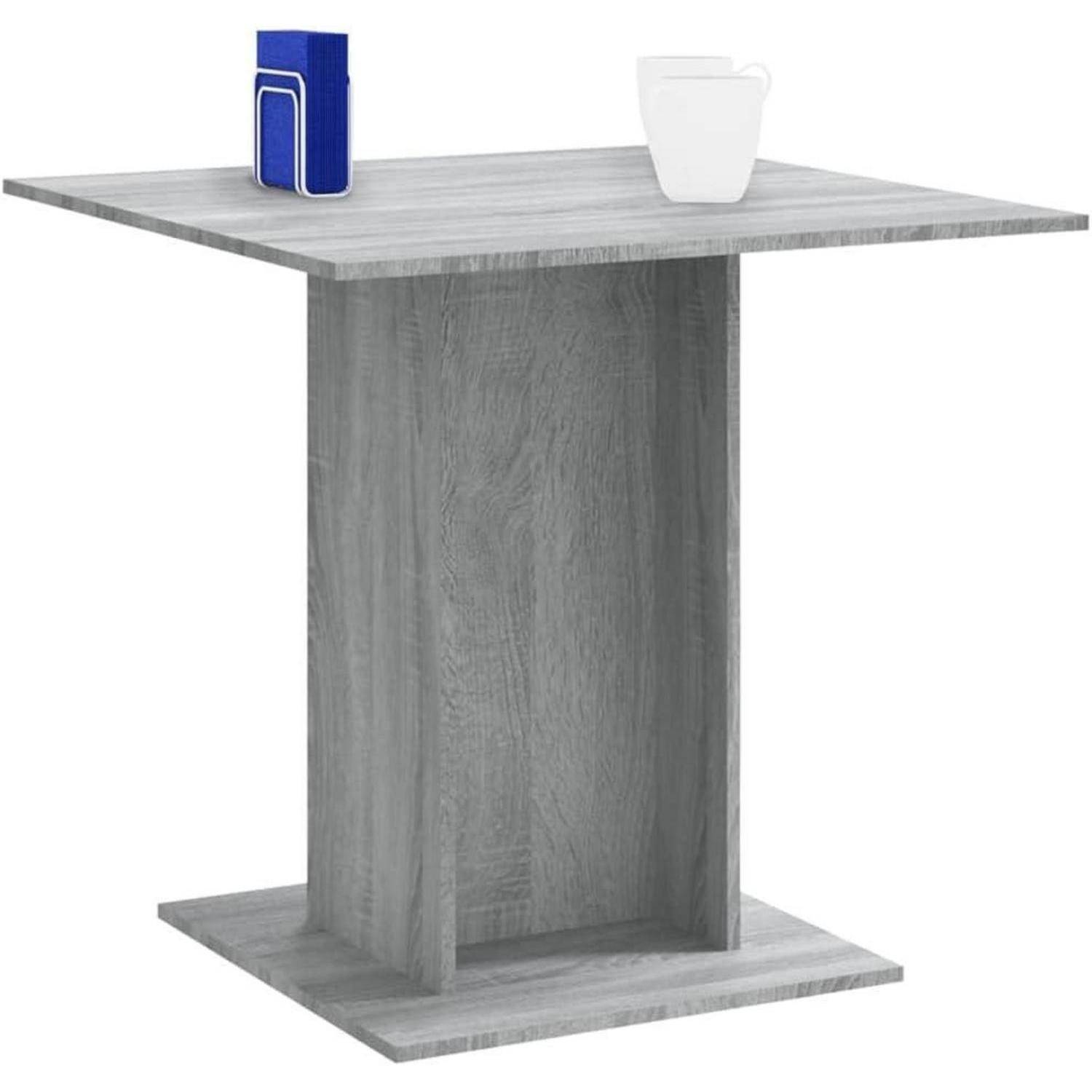 Grauer Pedestal-Tisch mit Holzoptik, quadratischer Tischplatte und Sockel, gezeigt mit einem blauen Behälter und einer weißen Tasse obenauf.