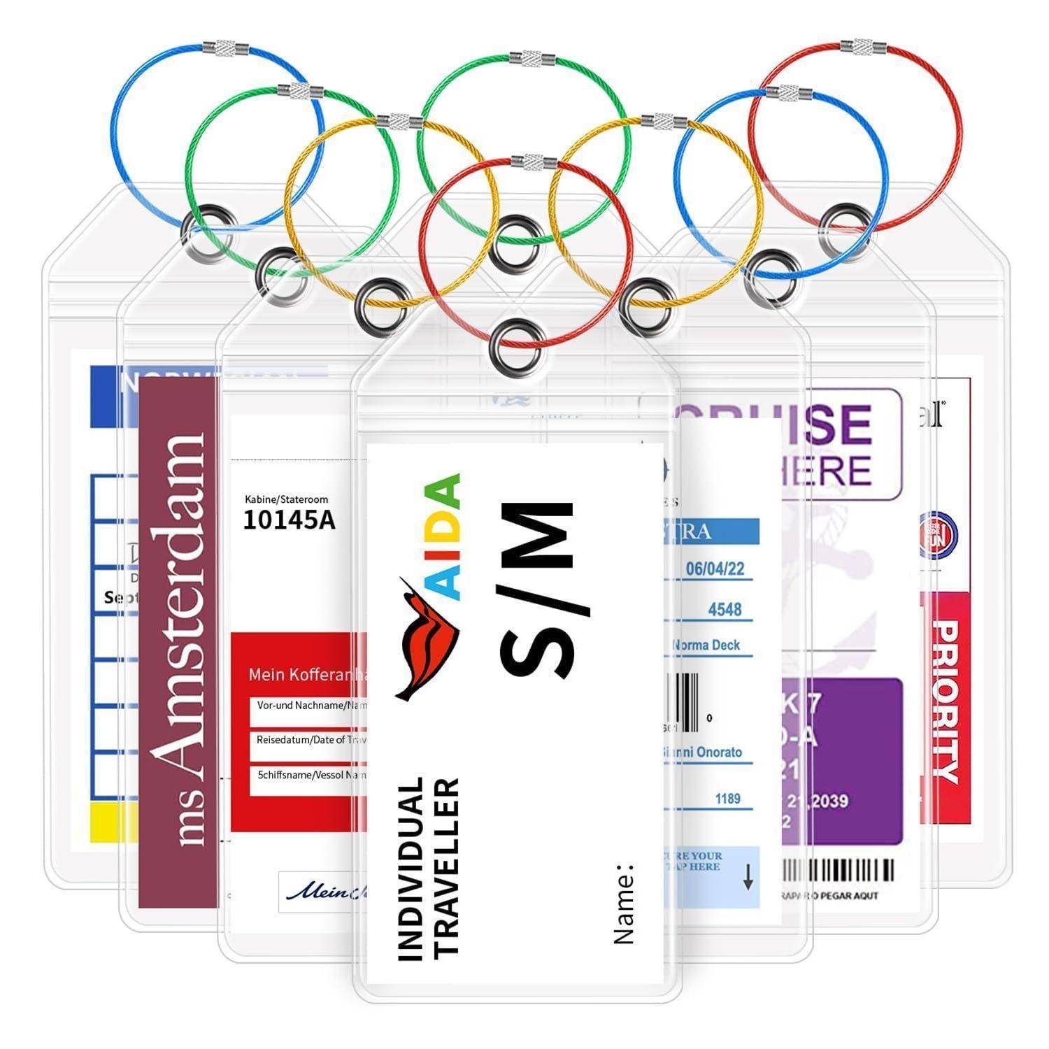 Olympische Ringe aus mehrfarbigen Gepäckanhängern oder Ausweisbadges, einschließlich eines zentralen Tags mit der Aufschrift „INDIVIDUAL TRAVELLER