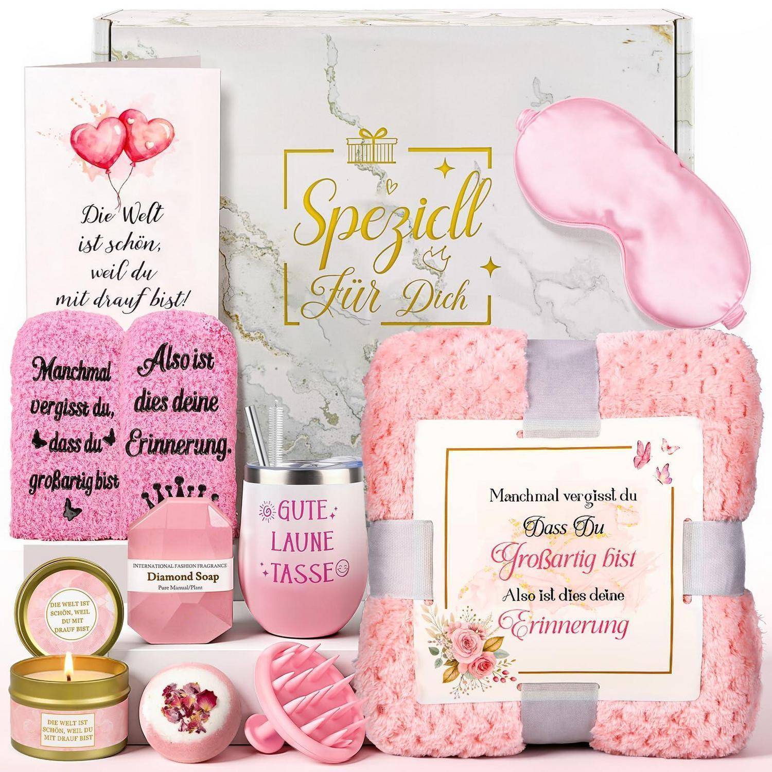 Geschenkbox mit rosa-farbigen Selbstpflege-Artikeln, einschließlich einer Decke, einer Augenmaske, einer Tasse, Seife, einer Kerze, einer Badebürste und deutschen Inspirationszitaten über das Gedenken an geliebte Menschen.