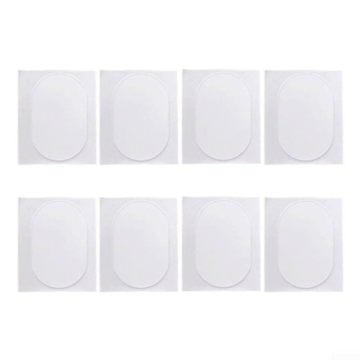 Acht weiße ovale selbstklebende Wandhaken oder Pads, die in zwei Reihen auf einem einfachen weißen Hintergrund angeordnet sind.