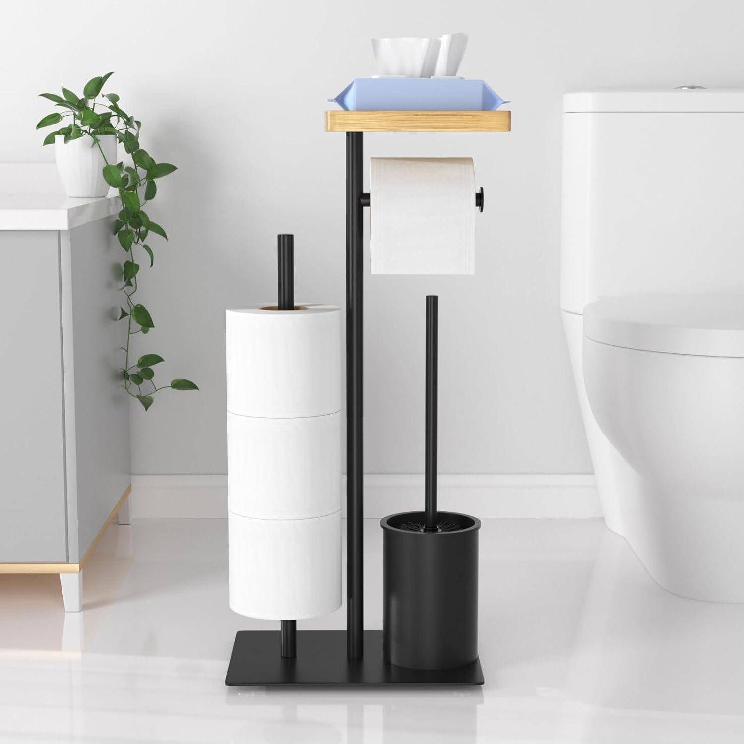 Moderner Badezimmer-Toilettenpapierhalter mit zusätzlichem Rollenlagerbestand und Taschentuchbox oben, neben einer Toilette und einer Badezimmerpflanze auf hellem Boden.