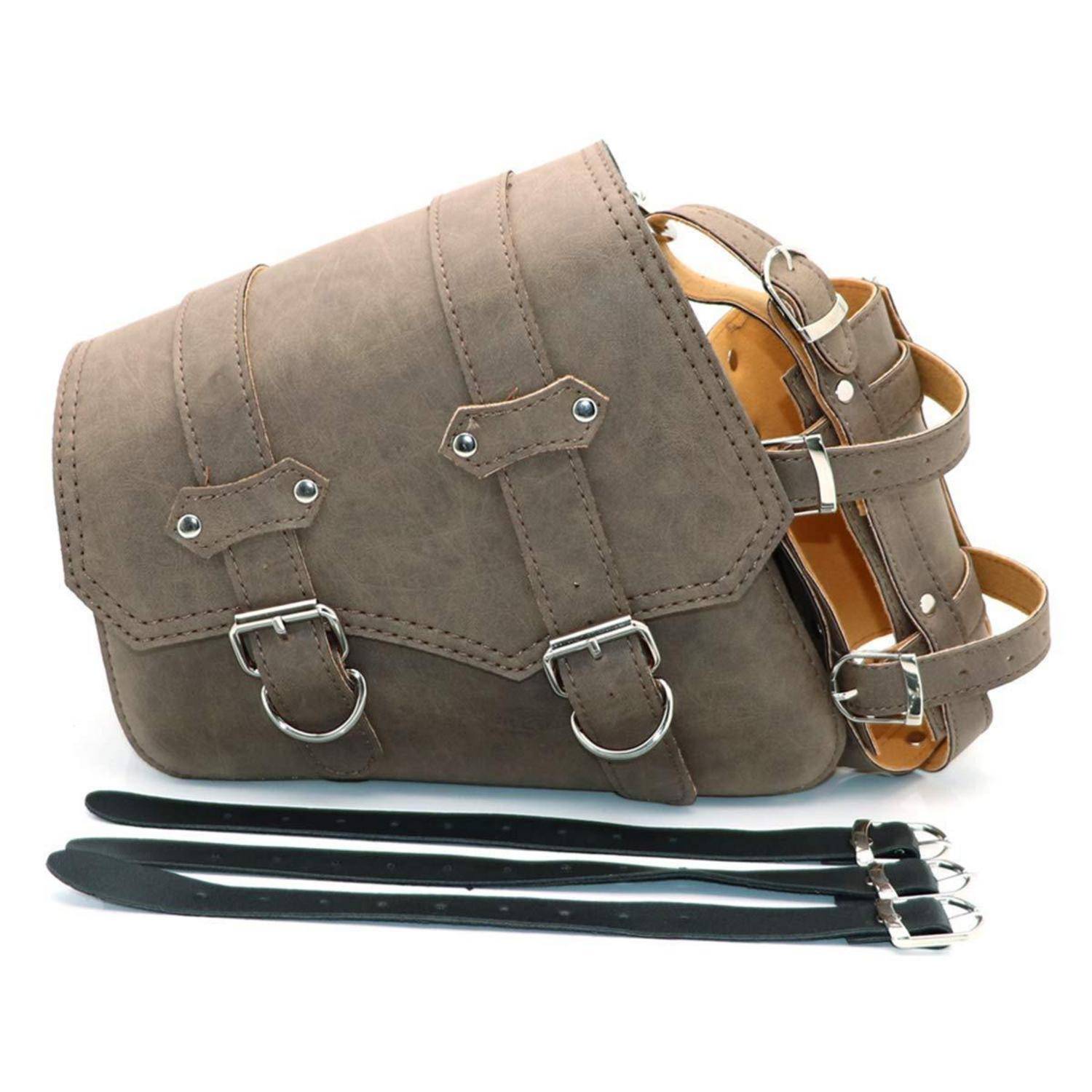 Braune Lederschultertasche mit Schnallen, gezeigt mit einem passenden Riemen und zwei schwarzen, riemenartigen Gurten auf weißem Hintergrund.