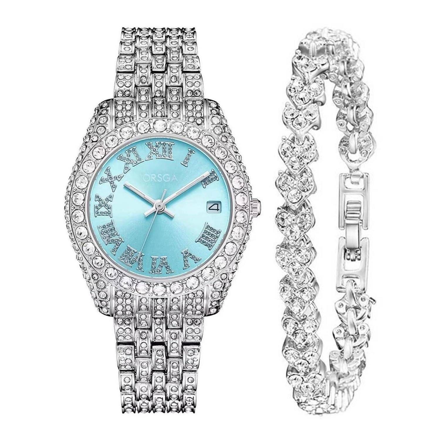 Silberne Armbanduhr mit Edelsteinen, türkisfarbenem Zifferblatt und diamantähnlichen Akzenten, abgebildet neben einem passenden Kristallarmband.