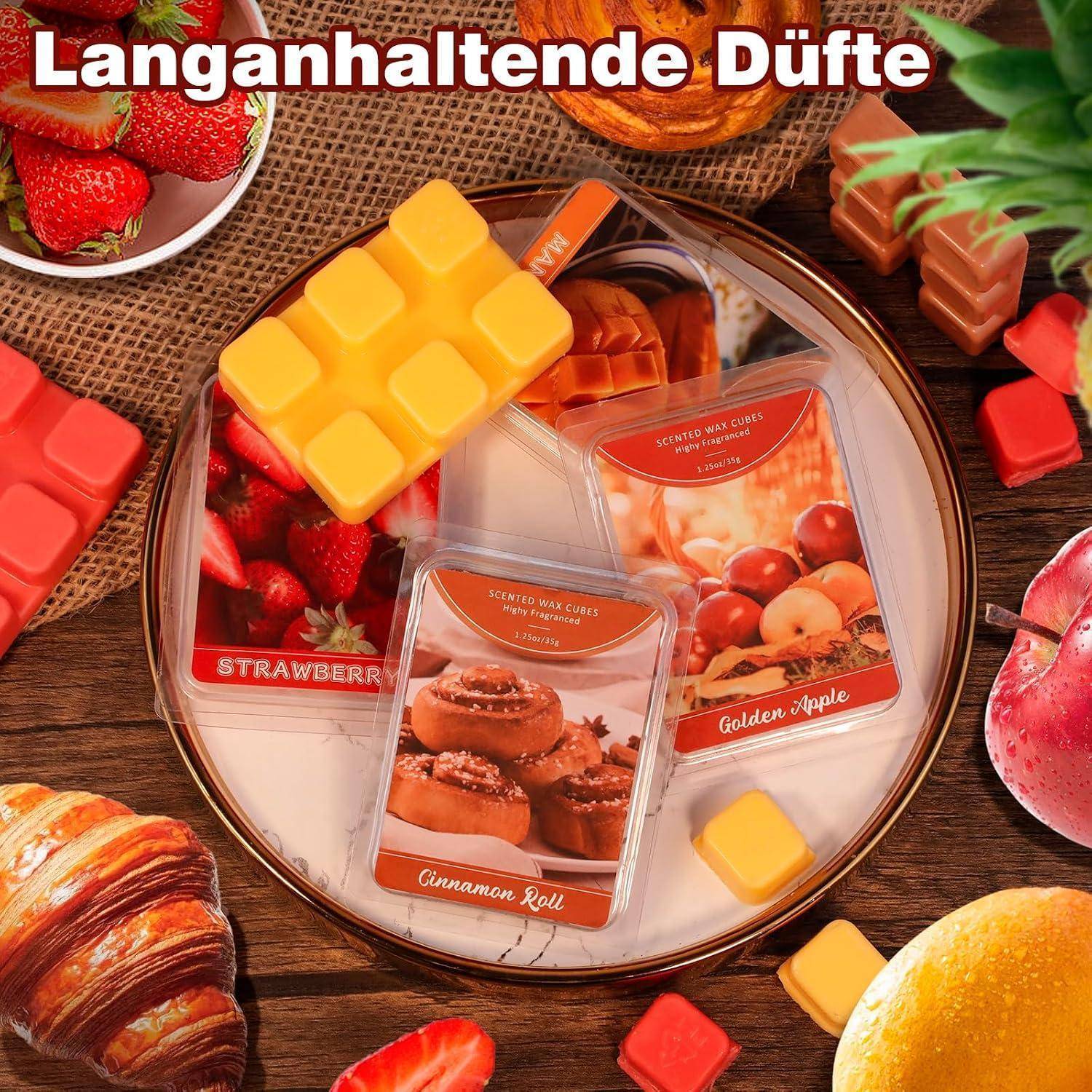 Duftende Wachswürfel-Muster auf einem Tablett mit Etiketten für Erdbeere, Zimtschnecke und goldener Apfel, umgeben von Obst- und Dessertimagerie; die Schlagzeile lautet „Langanhaltende Düfte".