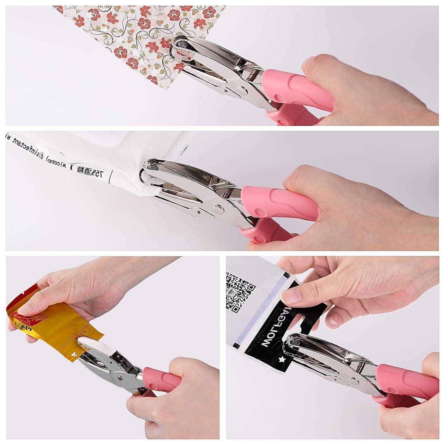 Eine Hand benutzt Locher mit rosafarbenem Griff, um ordentliche Löcher in Papier, Umschläge und Verpackungsmaterial zu stanzen.
