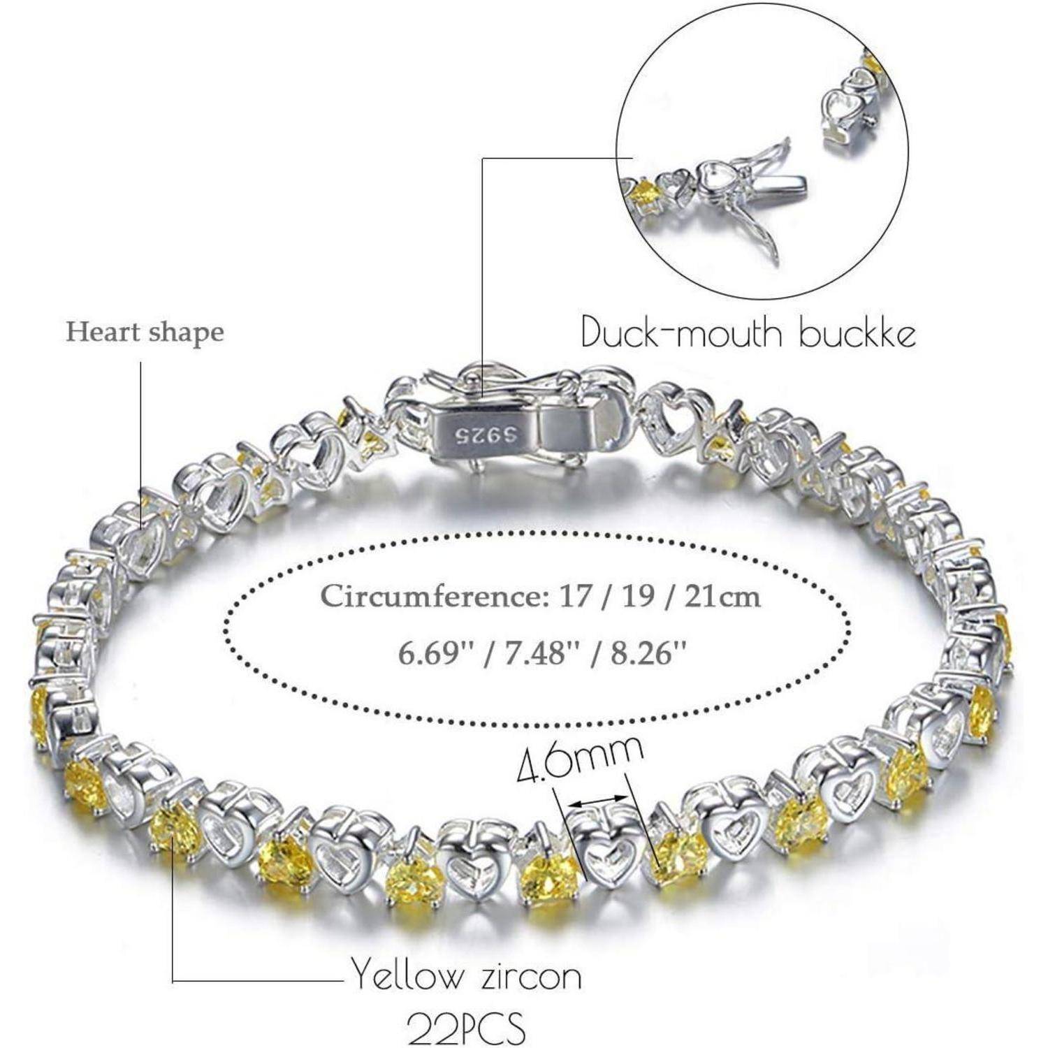 Silbernes herzförmiges Armband mit gelben Zirkonia-Akzenten, dargestellt mit beschrifteten Merkmalen: Entenschnabel-Verschluss und Größen 17, 19 und 21 cm.