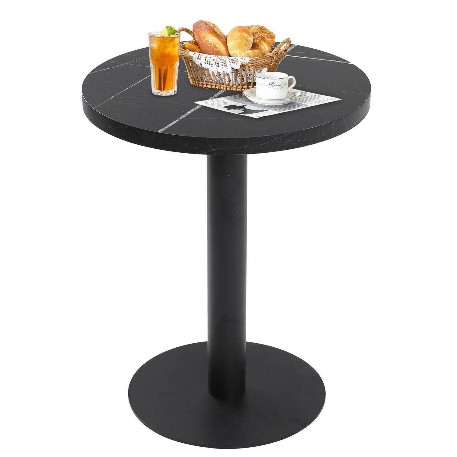 Runder schwarzer Säulentisch für Cafés mit einem Getränk, einem Brotkorb und einer Tasse oben drauf.