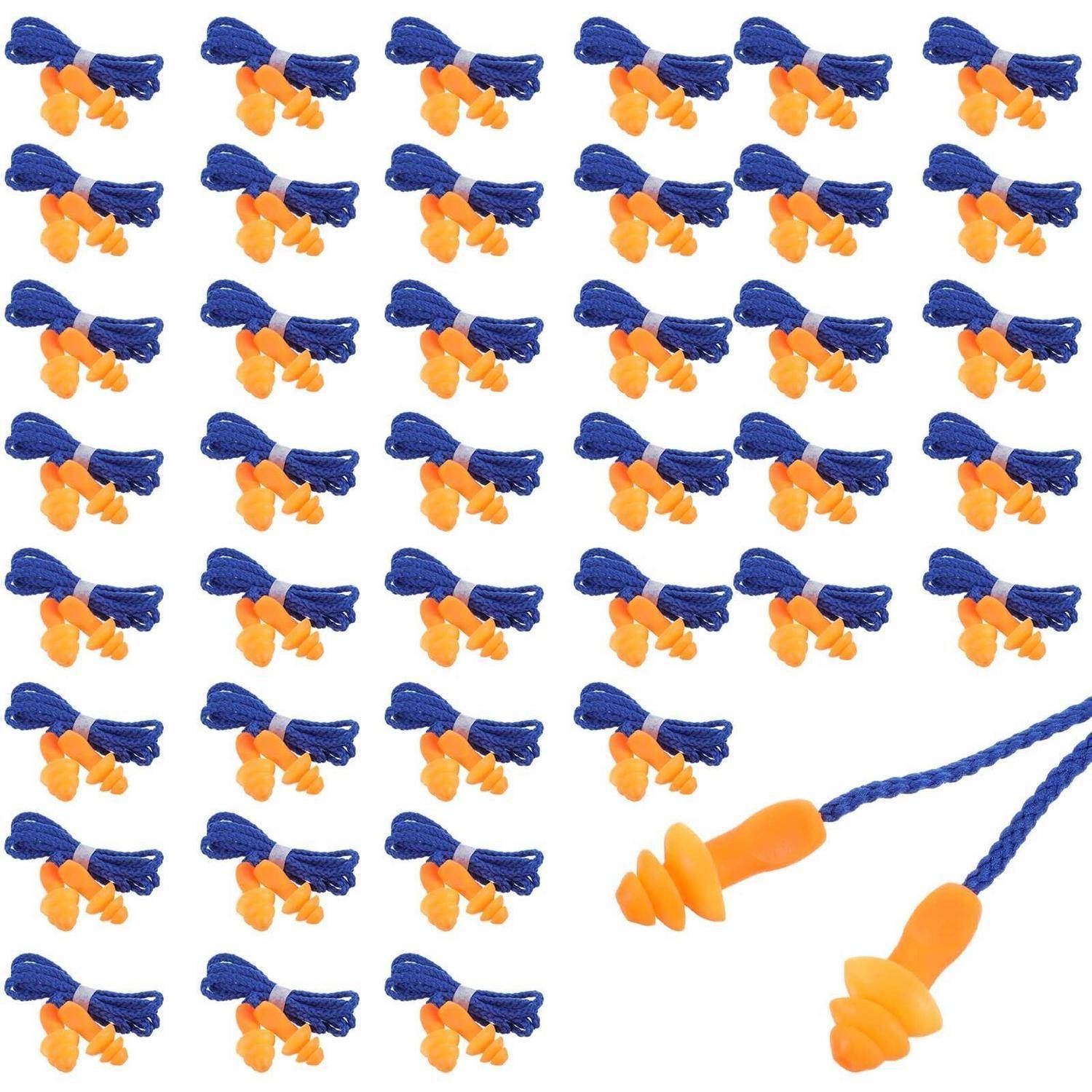 Verschiedenfarbige blaue und orange Ohrstöpsel, die als Muster dargestellt sind, mit einem nahaufnahmen Paar auf der rechten Seite für Skalierung und Details.