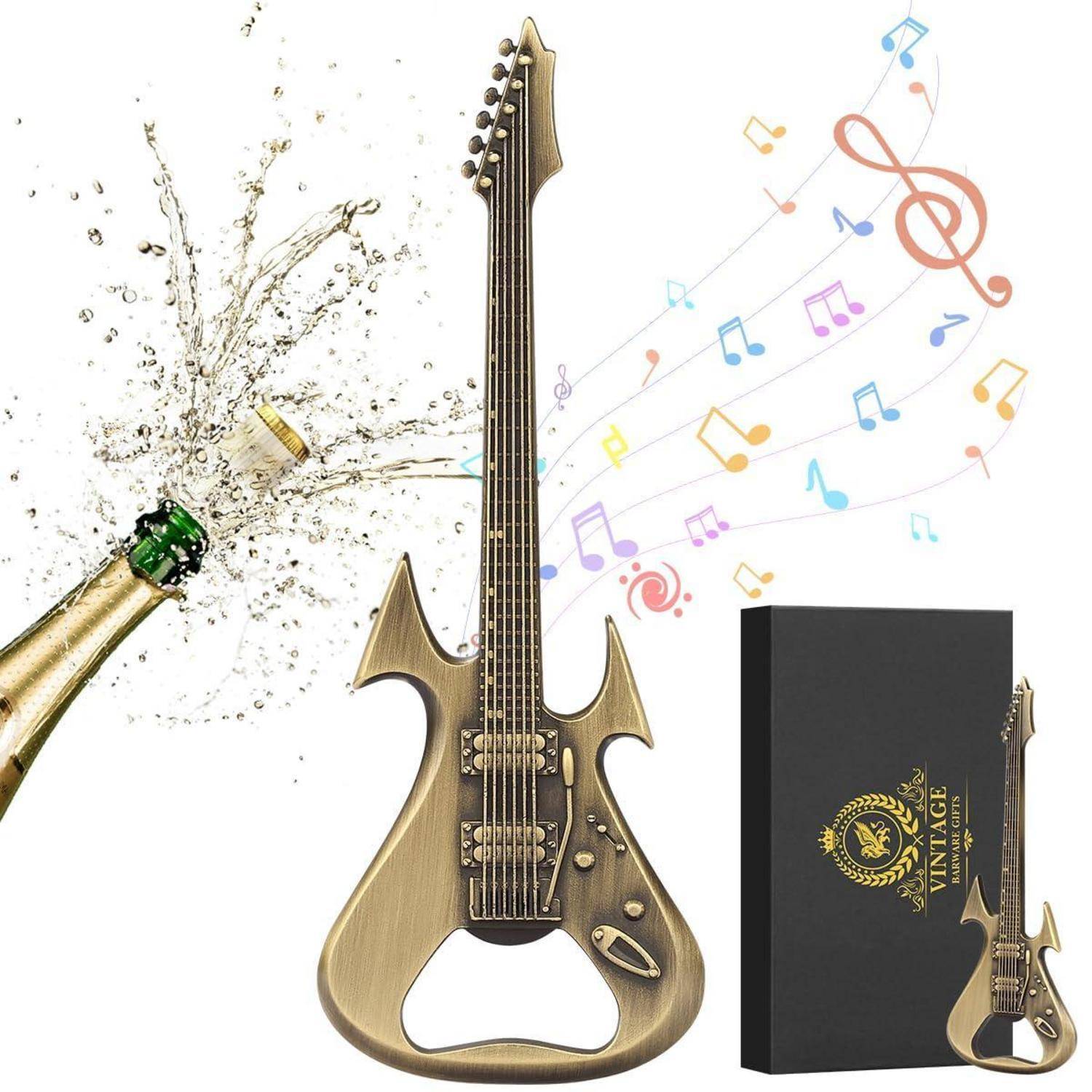 Goldene, flaschenöffner-förmige E-Gitarre mit einer Champagnerflasche, aus der der Korken knallt, und bunten Musiknoten, gezeigt mit einer schwarzen Geschenkbox.