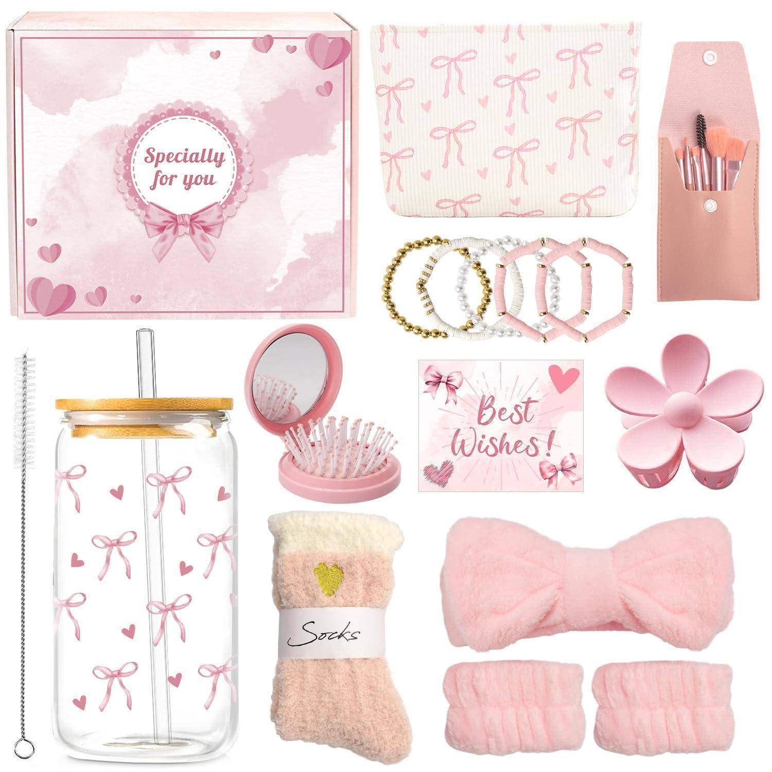 Rosa Geschenkbox und passende Beauty-Accessoires-Set, bestehend aus Kosmetiktasche, Armbändern, Makeup-Pinsel-Halter, Glas, Spiegel, Socken, Stirnband, Haargummis und Karte mit dem Text „Alles Gute!