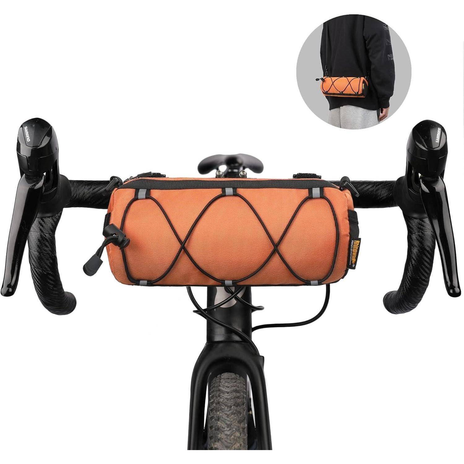 Orangefarbene Lenkstangentasche an den Drop-Bars eines Fahrrads befestigt, von vorne gezeigt mit einer Detailansicht der Montage am Fahrrad.