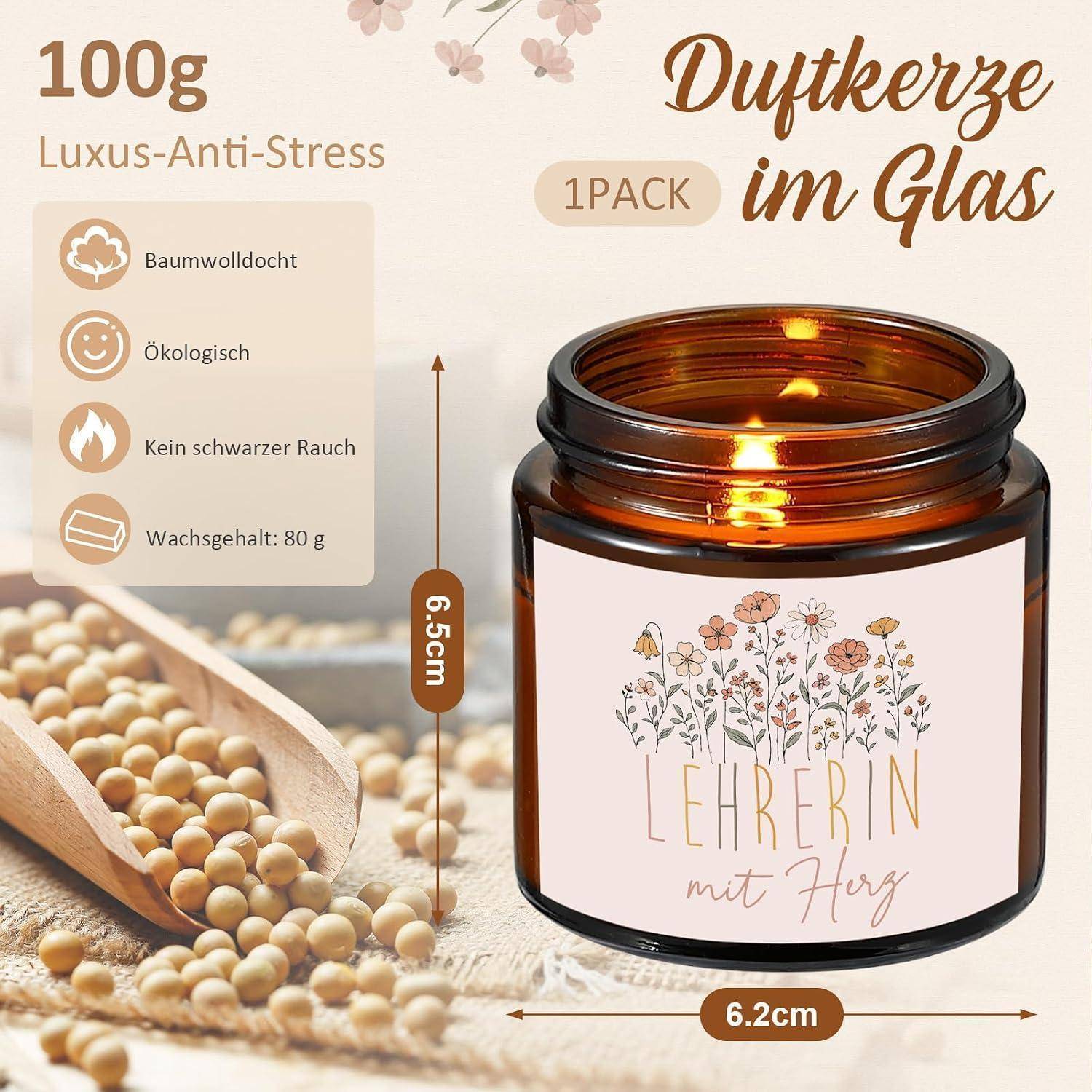 Produktbild eines Duftkerzen-Glases aus Bernsteinglas mit der Aufschrift „LEHRERIN mit Herz