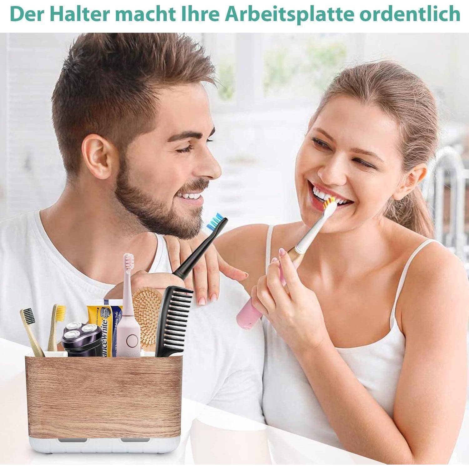 Lachendes Paar putzt Zähne neben einem Holzhalter, der Zahnbürsten und Pflegeartikel organisiert; deutscher Text sagt „Der Halter hält deinen Arbeitsbereich ordentlich