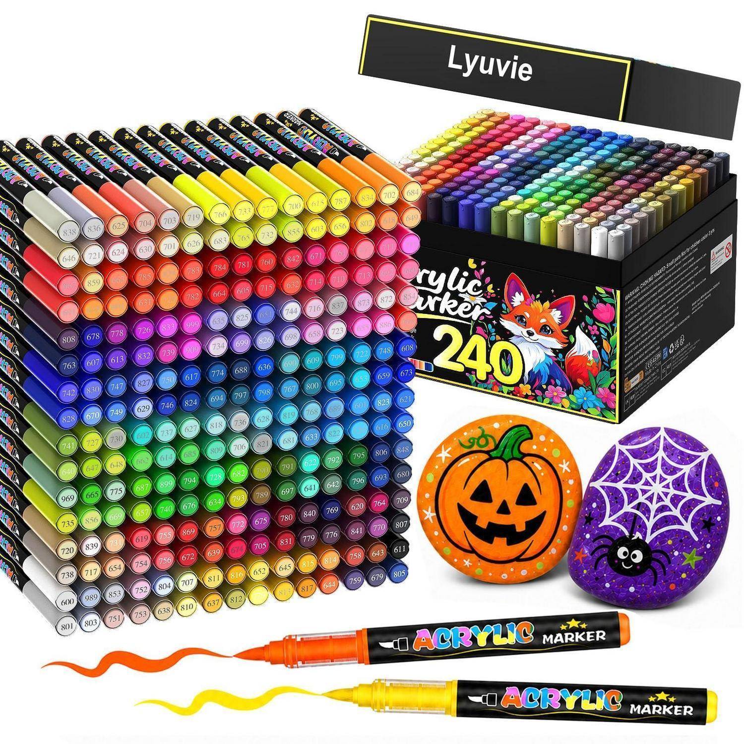 Kasten mit 240 Lyuvie-Acrylmarkern, sortiert nach Farbe, gezeigt mit zwei bemalten Steinen, die als Kürbis und Spinnennetz bemalt sind, plus zwei Marker davor.