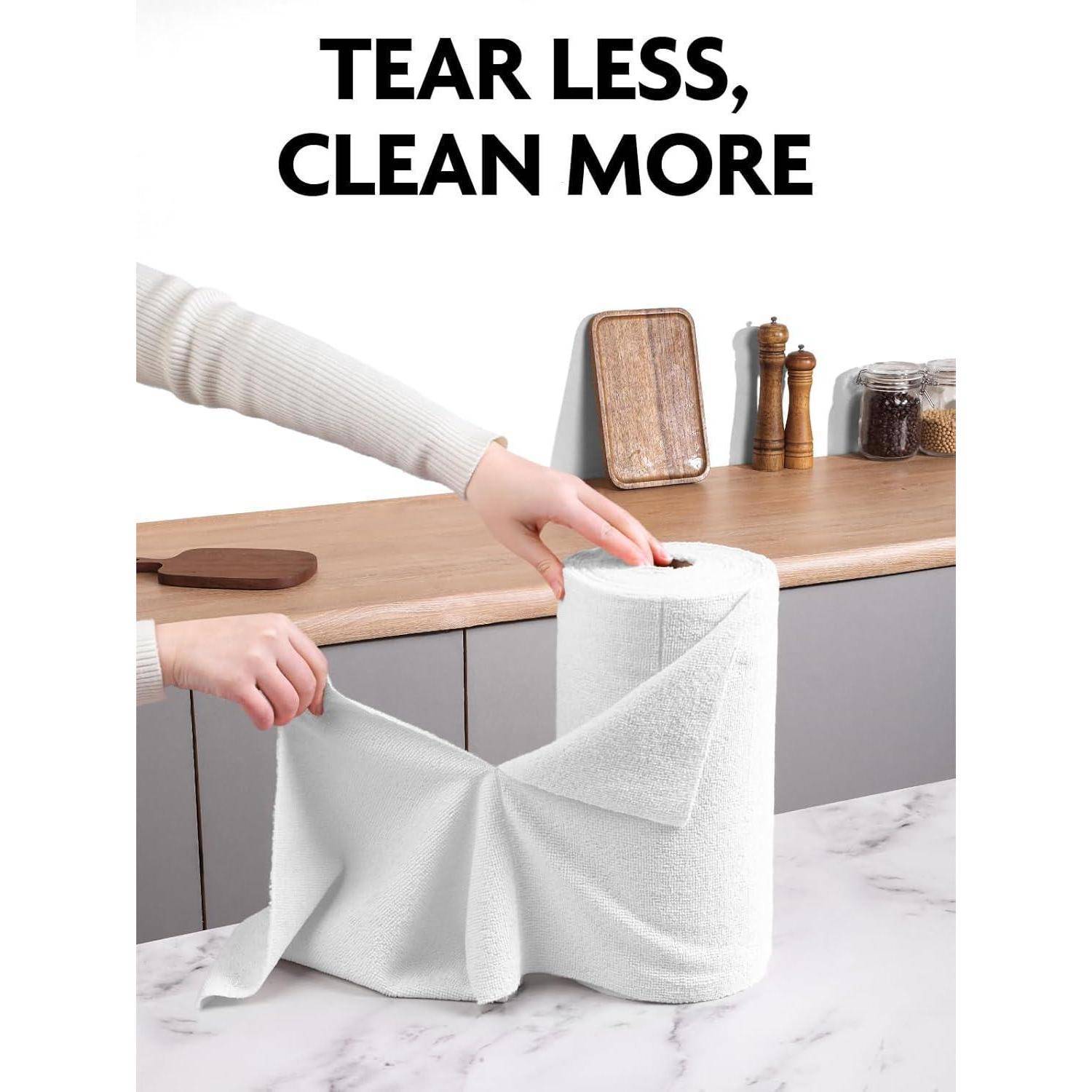 Hände, die ein Papiertuchblatt von einer Rolle abreißen, mit dem Slogan „WENIGER REISSEN, MEHR REINIGEN" oben.