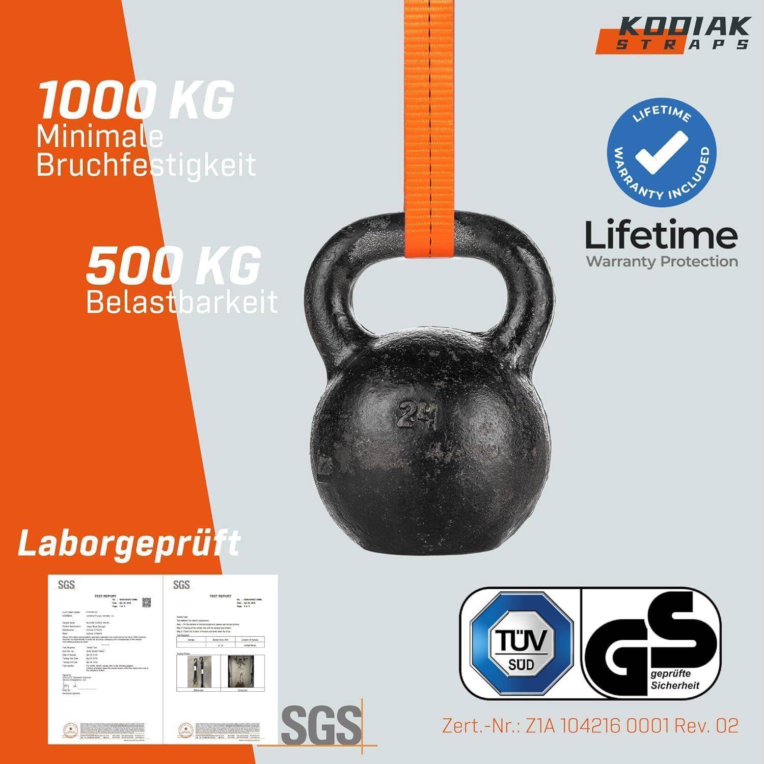 Kettlebell-ähnliches Gewicht, das von einem orangefarbenen Riemen hängt, mit deutschen Beschriftungen für 1000 kg Mindestbruchfestigkeit, 500 kg Tragfähigkeit, im Labor getestet und Symbolen für lebenslange Garantie.