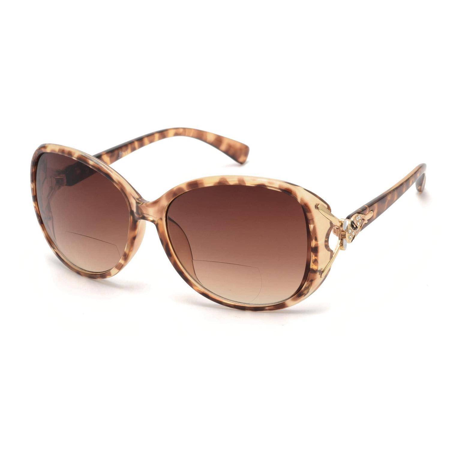Übergroße Sonnenbrille aus braunem Schildpatt mit Farbverlaufsgläsern und goldenen Seitenelementen auf weißem Hintergrund.