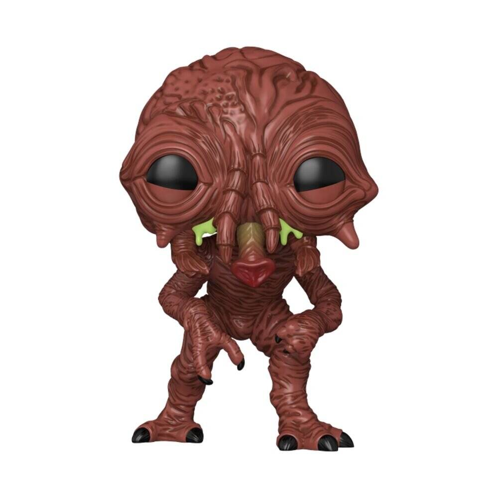 Kleine braune Monster-Figur mit übergroßen schwarzen Augen, vor einem einfachen weißen Hintergrund.