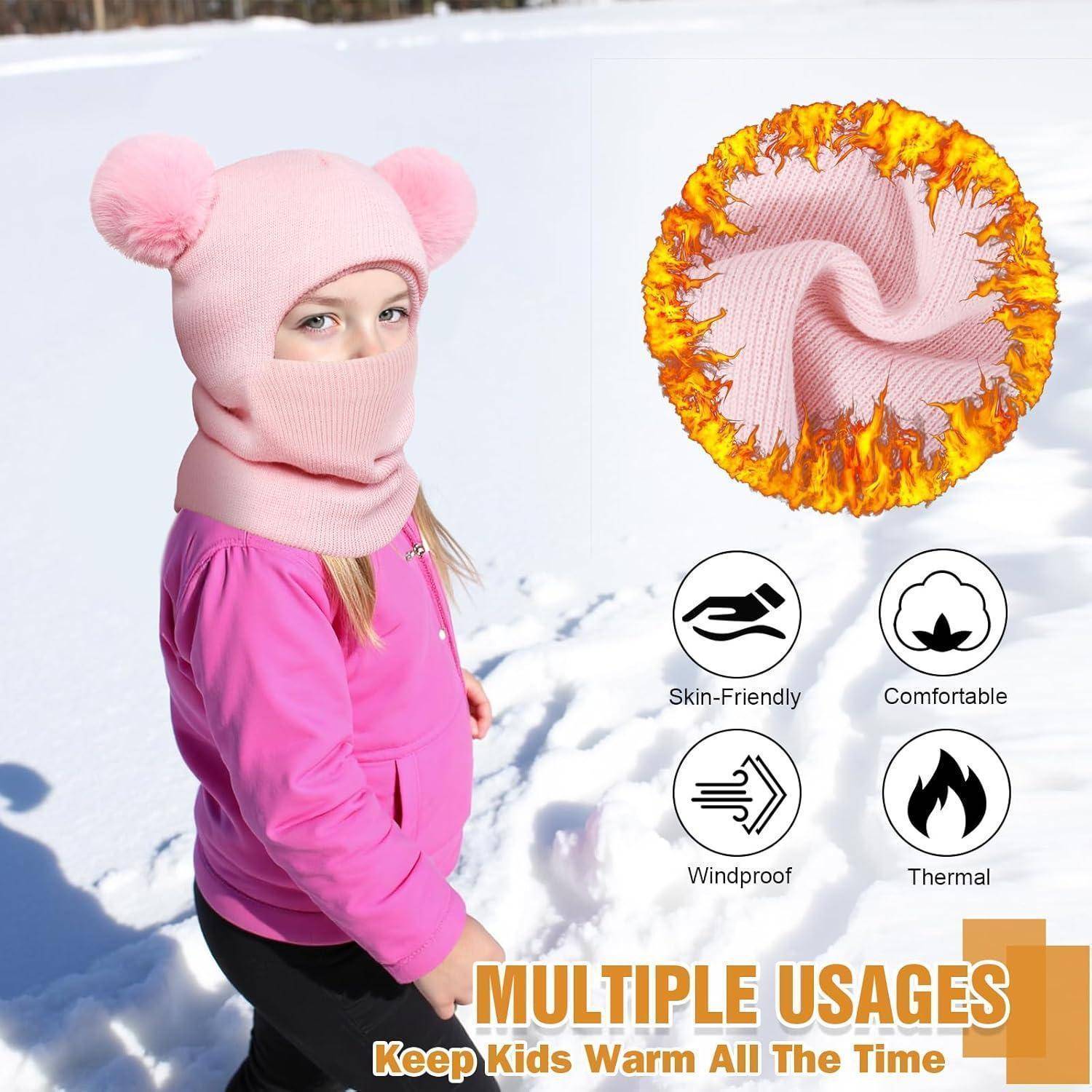 Kind trägt rosa Wintermütze und Gesichtsschutz im Schnee, gezeigt mit Produkteinschub und Symbolen für hautfreundlich, komfortabel, winddicht und wärmend; Text lautet „VIELFÄLTIGE VERWENDUNGEN" und „Halten Sie Kinder jederzeit warm"".