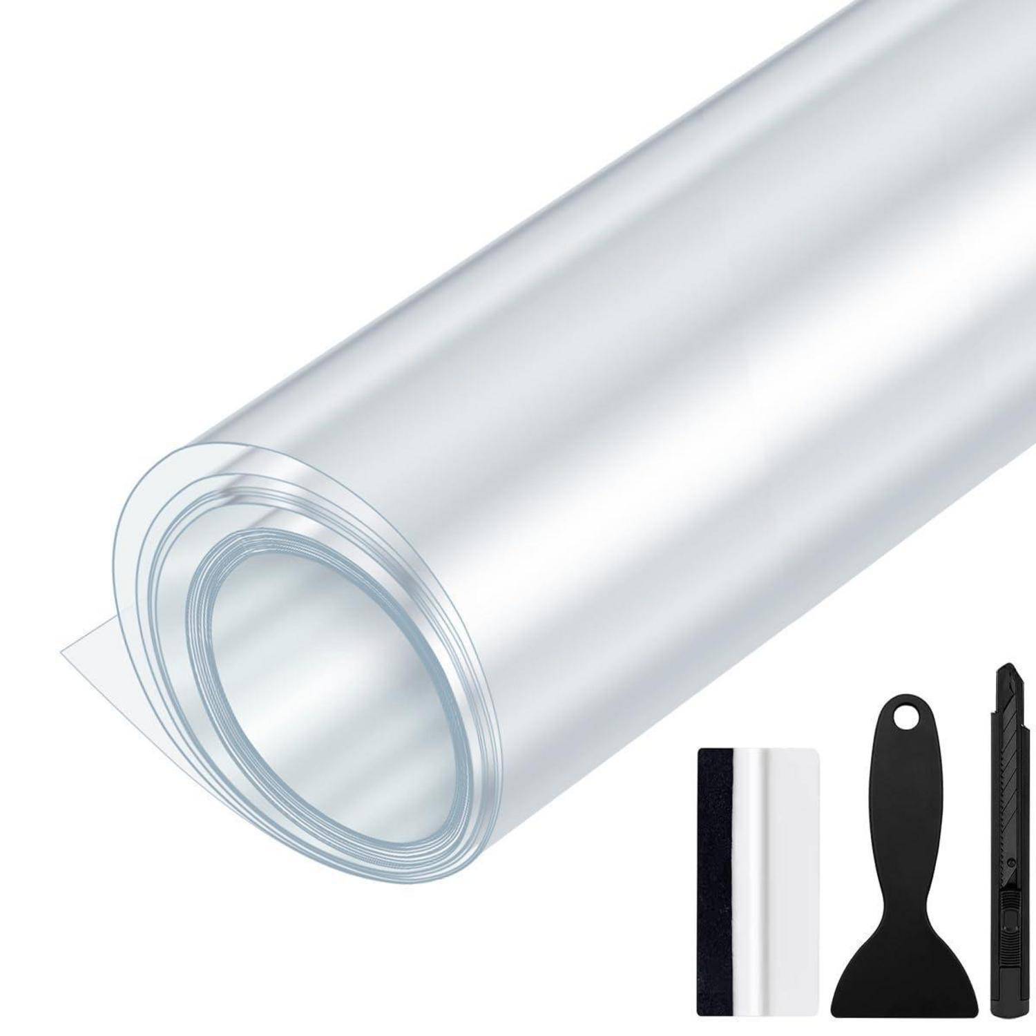 Rolle aus transparentem Klebeband mit Rakel und Universalmesser, was auf ein Fensterfolien- oder Vinyl-Installationsset hindeutet.