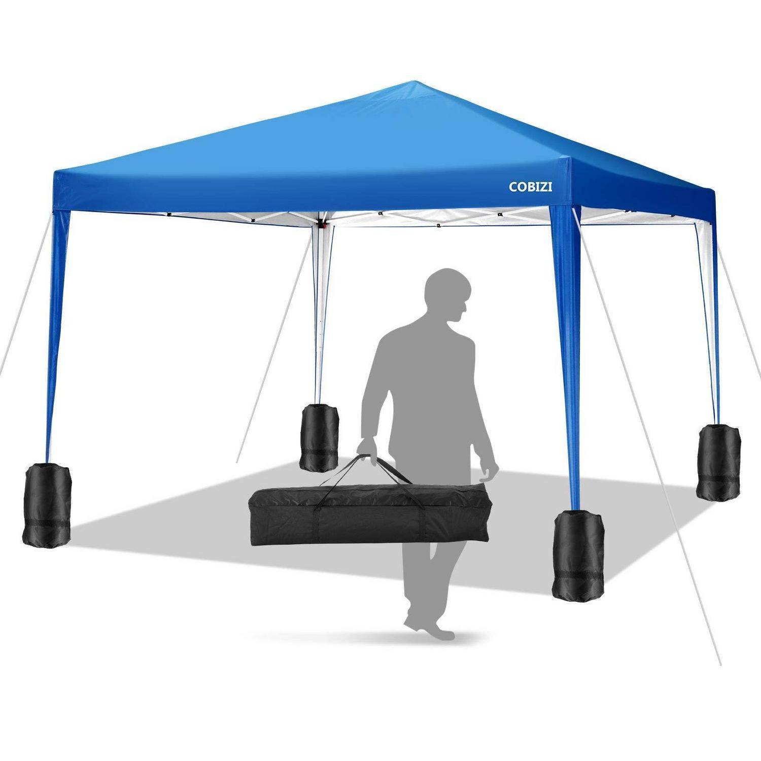Blauzeltkuppel COBIZI Pop-up-Zelt mit vier beschwerten Beinen, dargestellt mit einer Person, die eine lange schwarze Tasche darunter trägt.