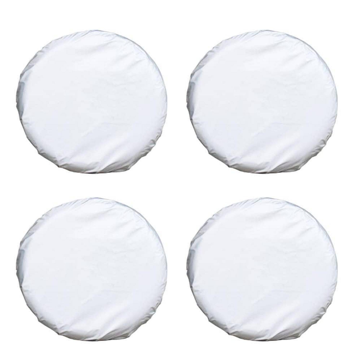 Vier schlichte weiße runde Kissen oder Pads in einem 2x2-Raster auf weißem Hintergrund angeordnet.