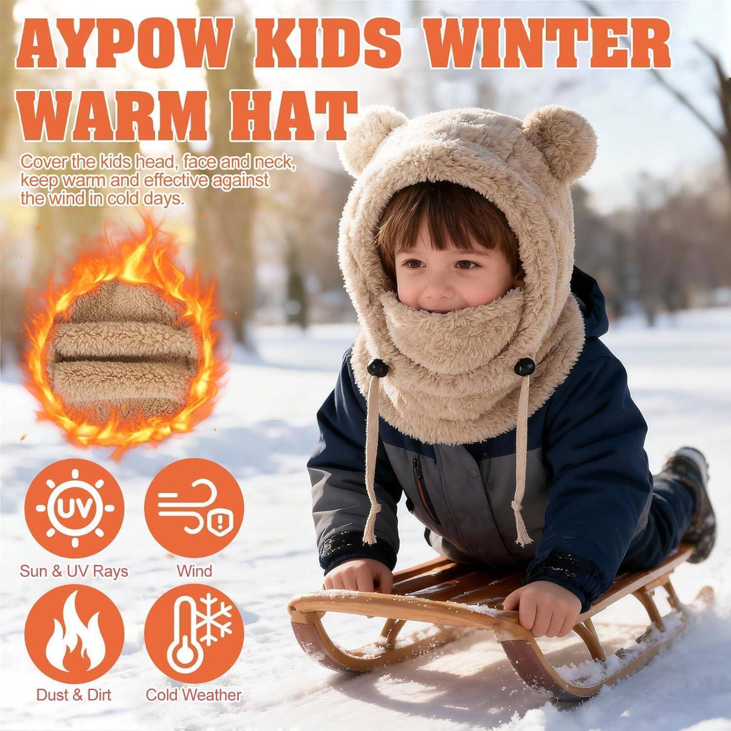 Anzeige für "AYPOW KIDS WINTER WARM HAT"" mit einem Kind in einer flauschigen Kapuzenmütze im Freien im Schnee, mit Symbolen für Sonne/UV, Wind, Staub und kaltes Wetter.