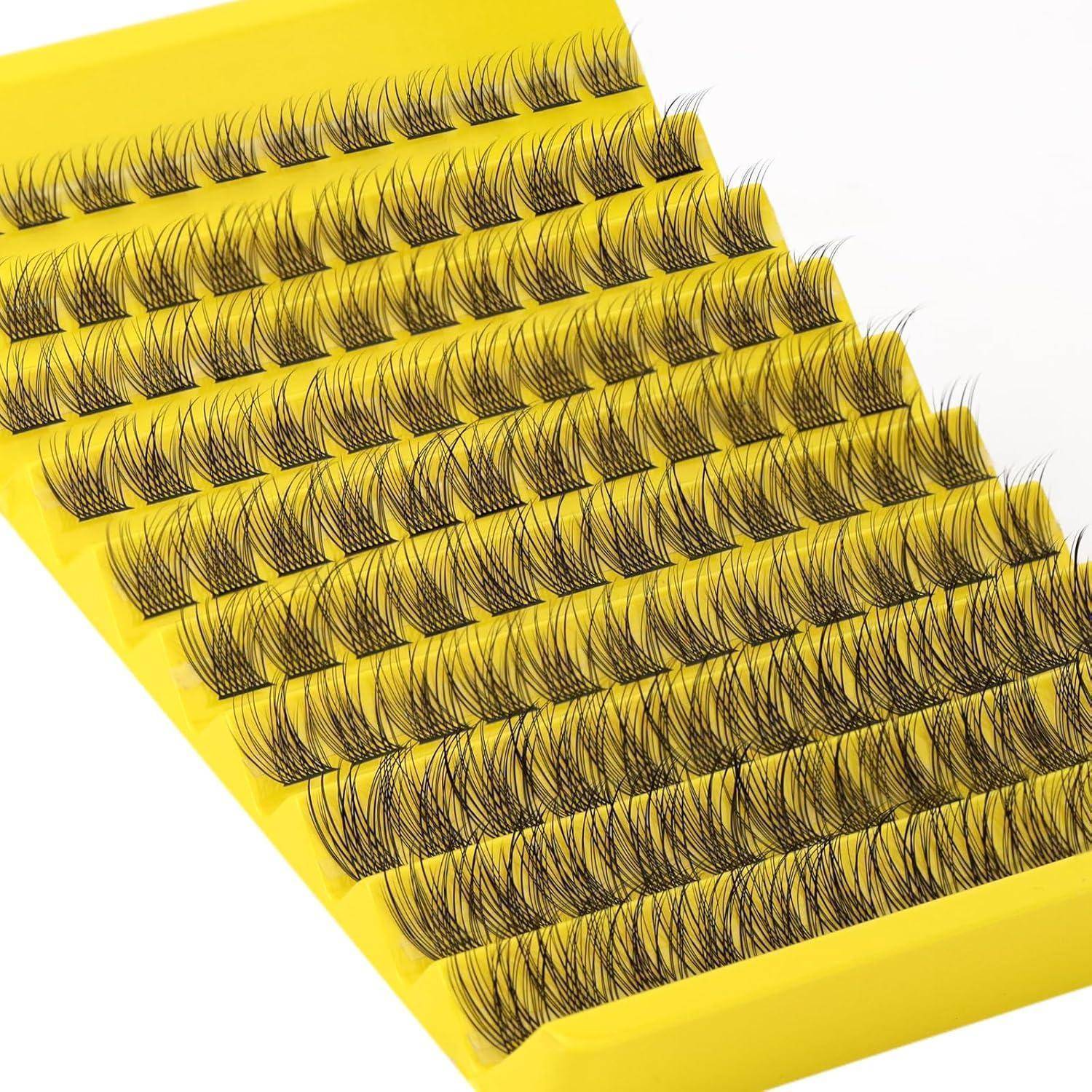 Nahaufnahme eines gelben Tabletts, das Reihen von Wimpernfächern in einem Gitterformat enthält.