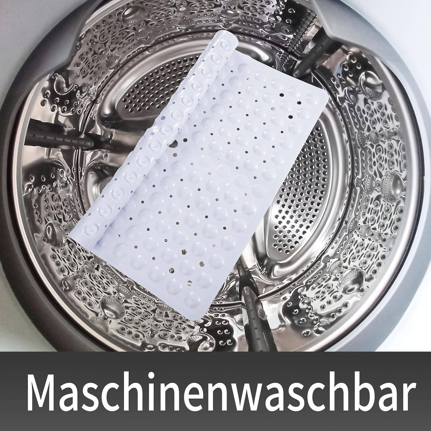 Weiße perforierte Trocknungsmatte in einer Waschmaschinetrommel mit dem deutschen Text „Maschinenwaschbar