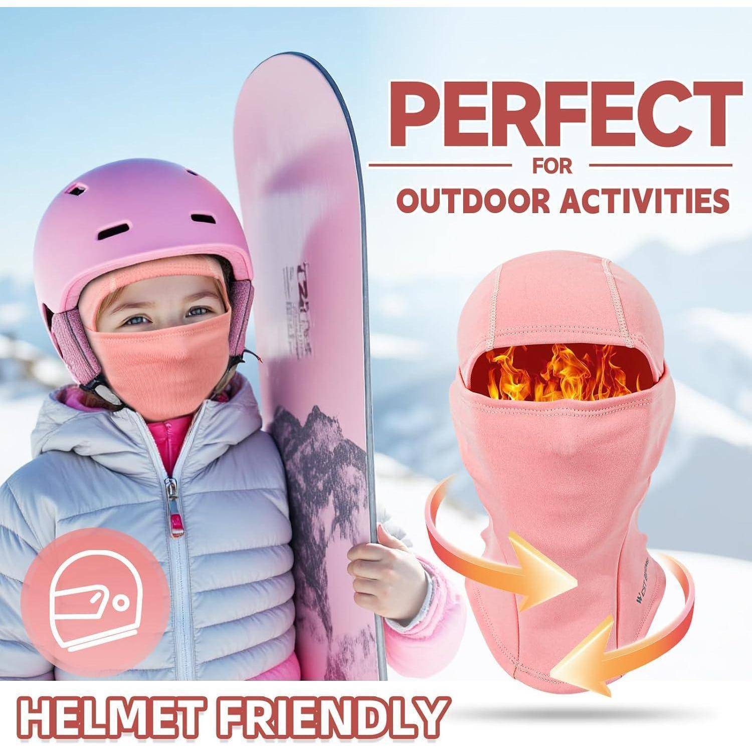 Anzeige mit einem Kind in einem rosa Skihelm und Gesichtsbedeckung neben einer rosa Sturmhaube mit Flammen im Inneren; der Text besagt „PERFEKT FÜR OUTDOOR-AKTIVITÄTEN" und „HELMKOMPATIBEL"".